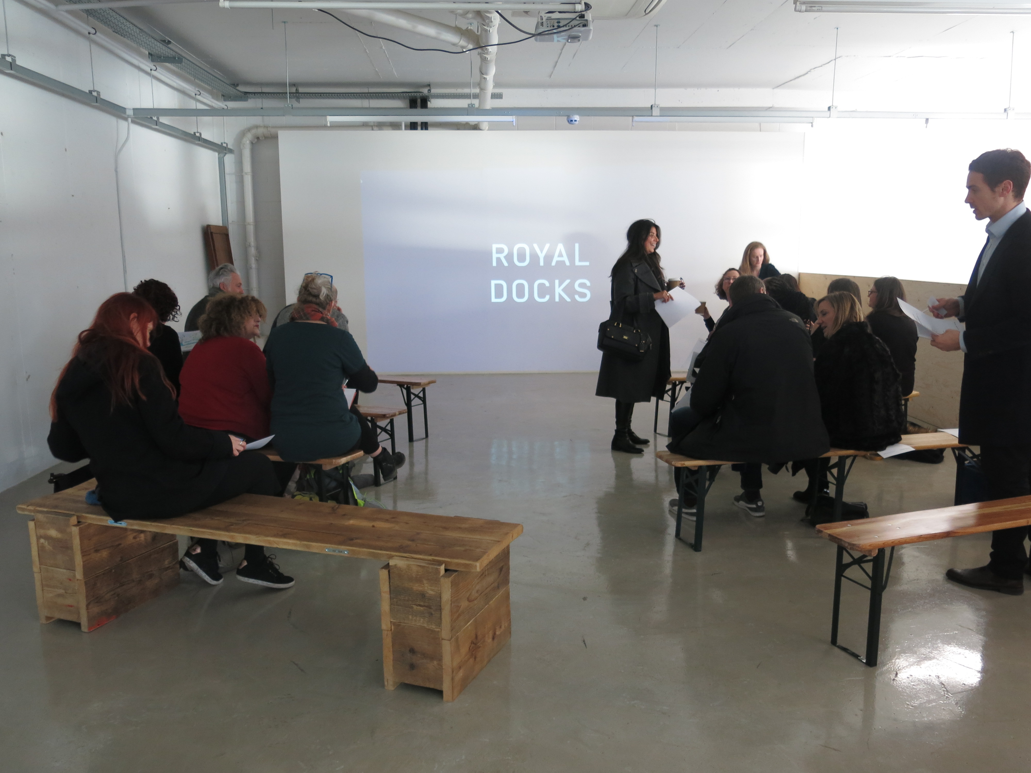 Mezanine Floor at R.A.W Labs, attendees on benches for a workshop event.
