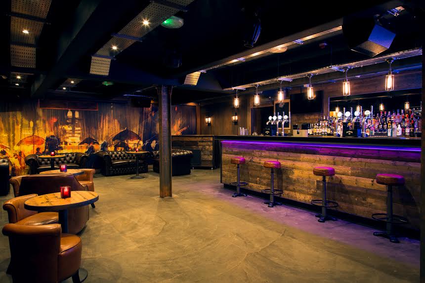 Stylish bar at Dive NQ, ideal for intimate gatherings and networking events.