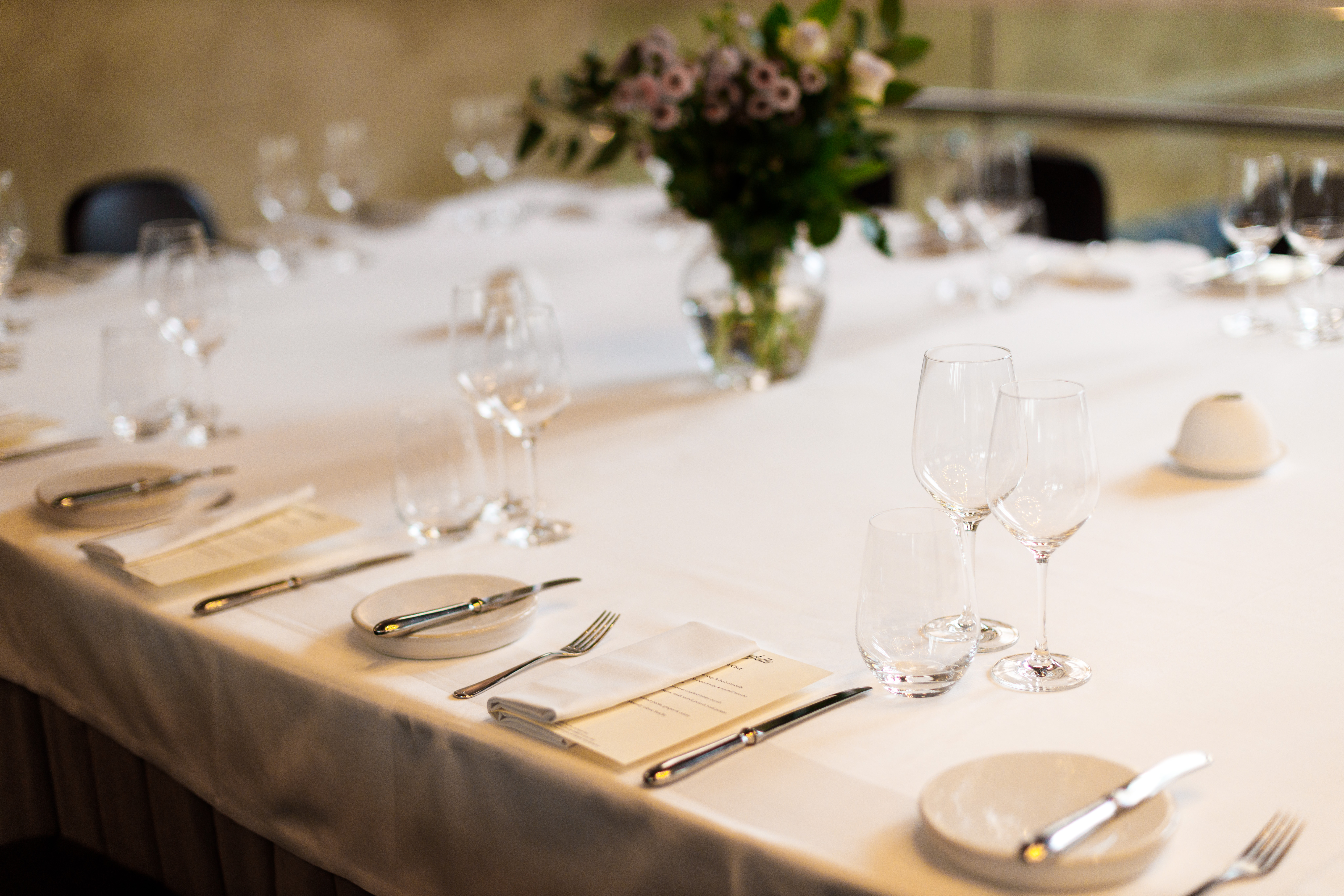 Elegant dining table setup at Galvin La Chapelle for corporate events and intimate dinners.