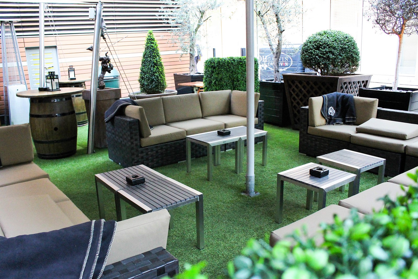 Stylish outdoor lounge at Le Jardin, perfect for networking events and casual gatherings.