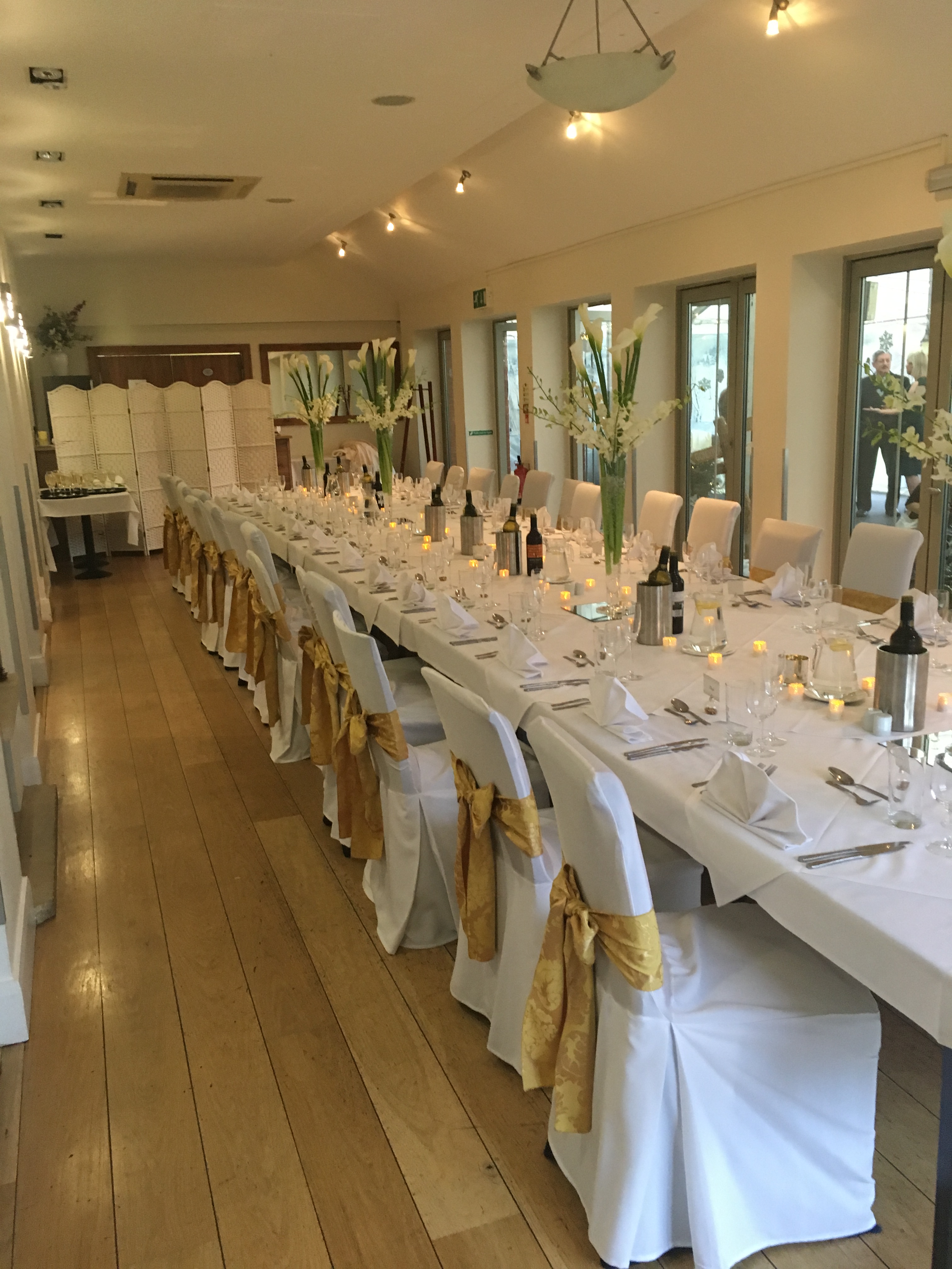 Terrace Suite banquet setup at Hampton Court Palace Golf Club for weddings and corporate events.