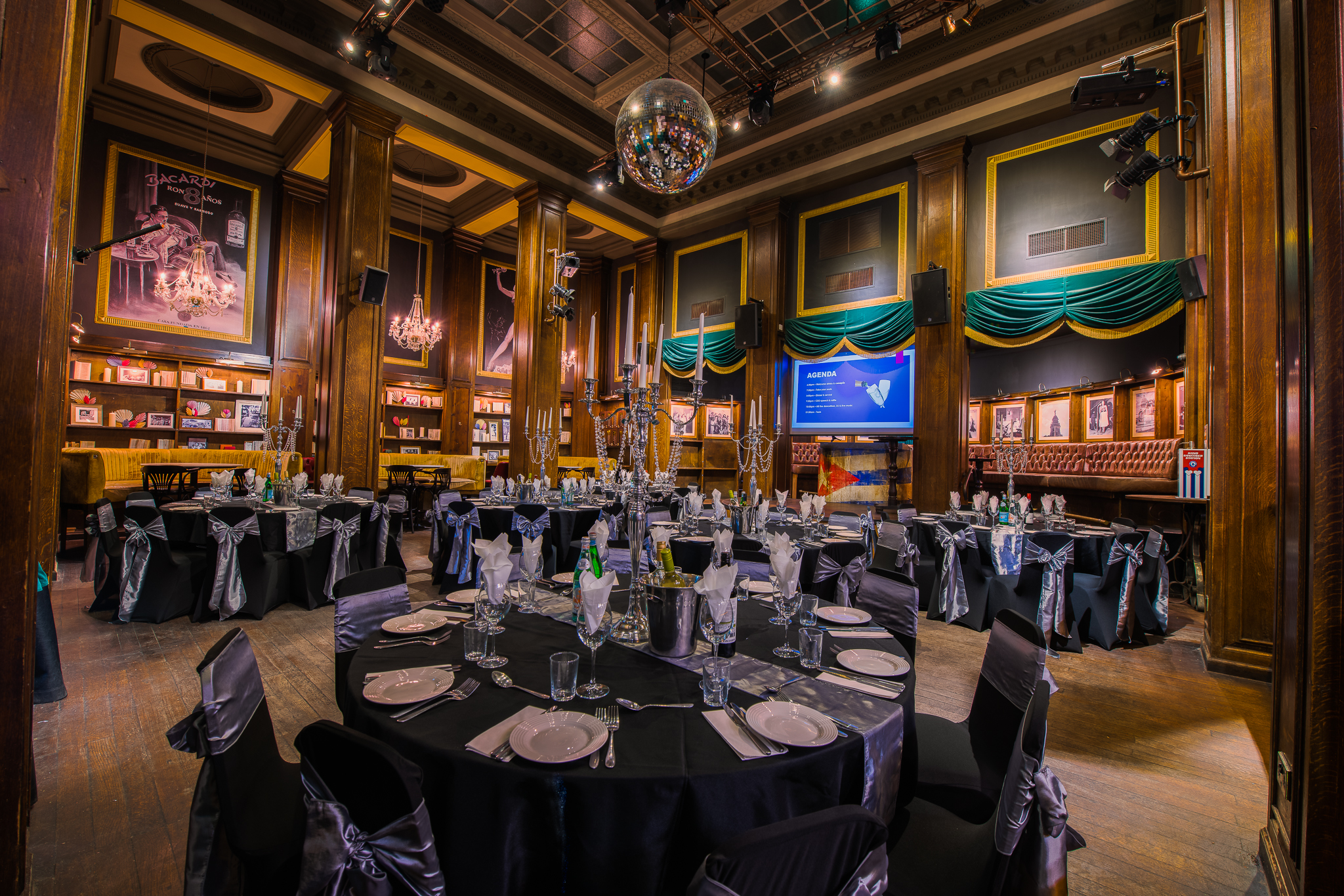 Elegant event space with round tables for corporate events in Revolucion De Cuba Birmingham.