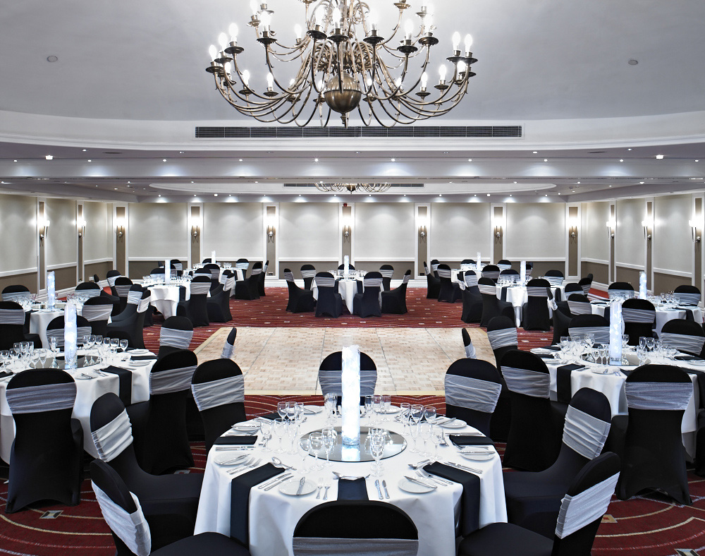 Elegant banquet hall in Portsmouth Marriott, set for weddings and corporate events.