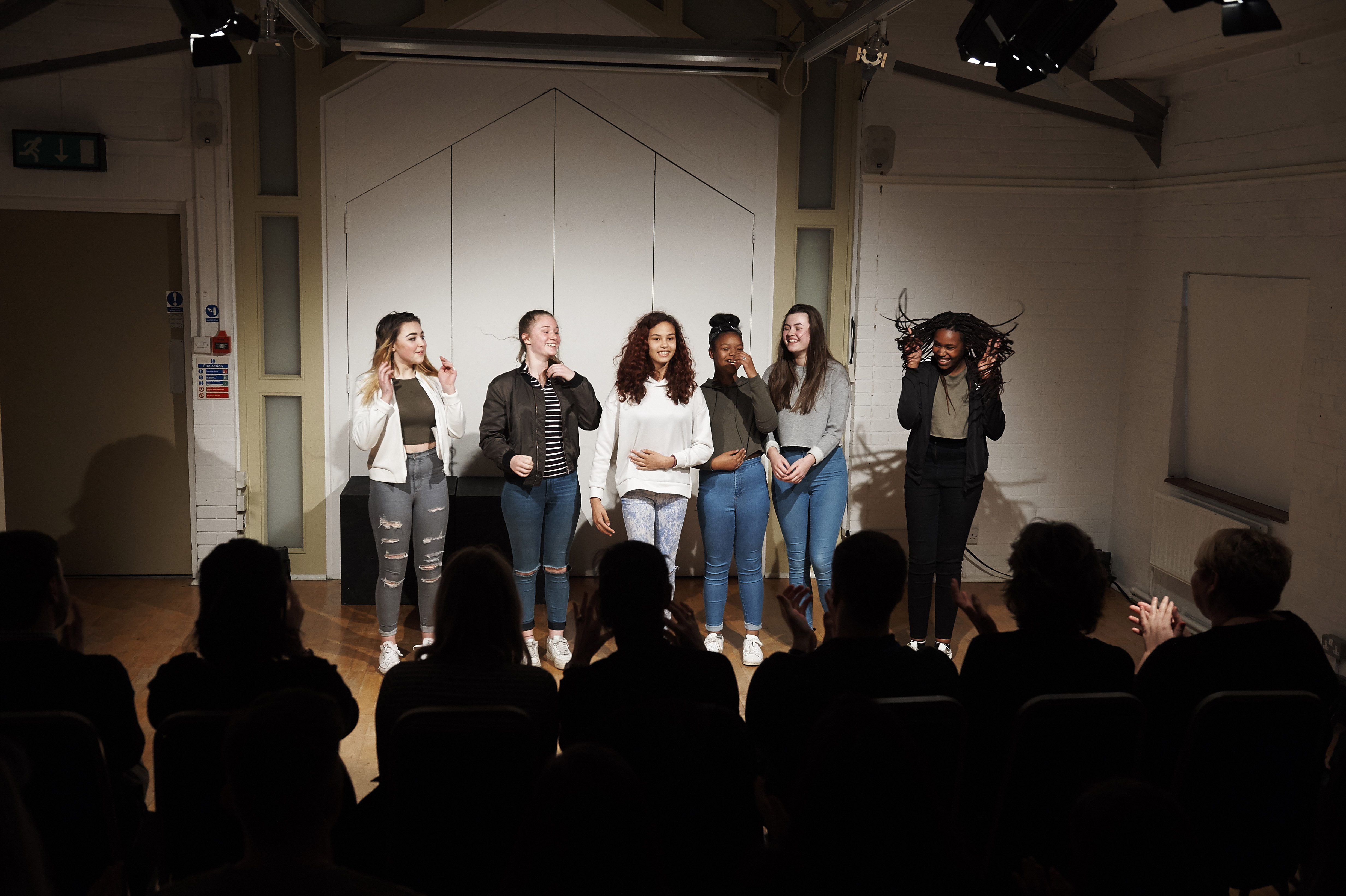 Dynamic performers engaging an audience in The Top Room, Oxford Playhouse for events.