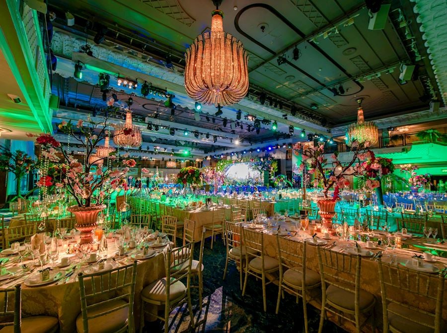 Elegant ballroom at JW Marriott with chandeliers, perfect for galas and corporate events.