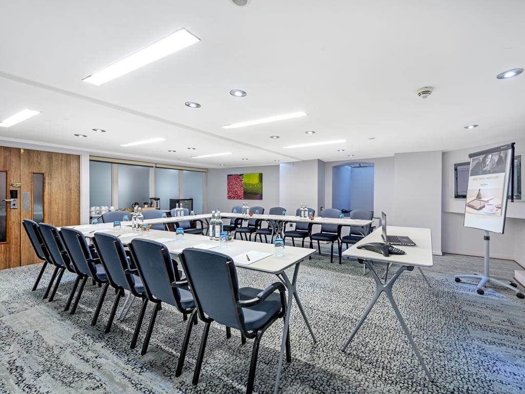 Westbourne Suite Conference Room with U-shaped table for professional meetings in London.