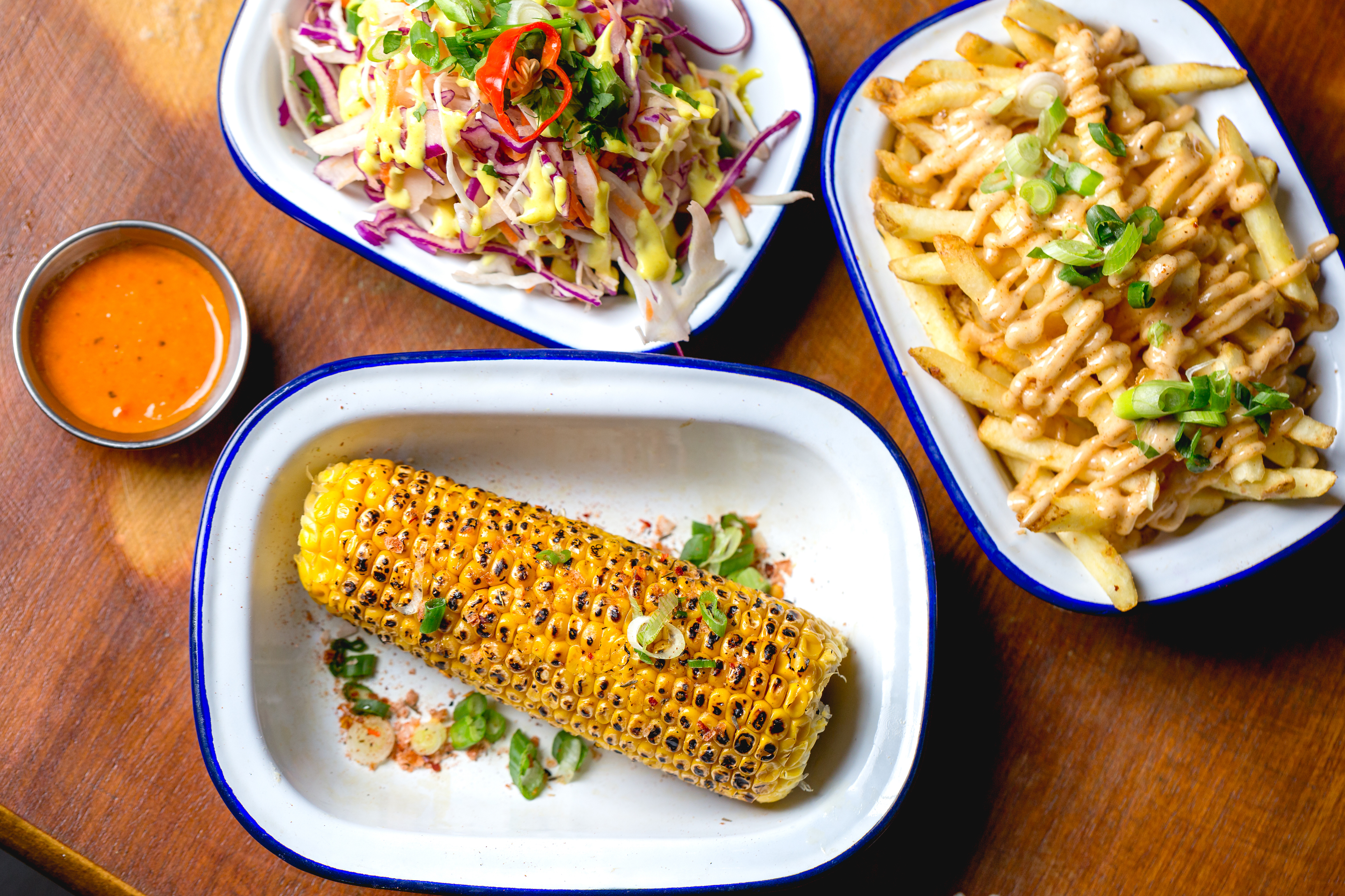 Vibrant food spread with grilled corn in Yellow Room, ideal for casual events and networking.