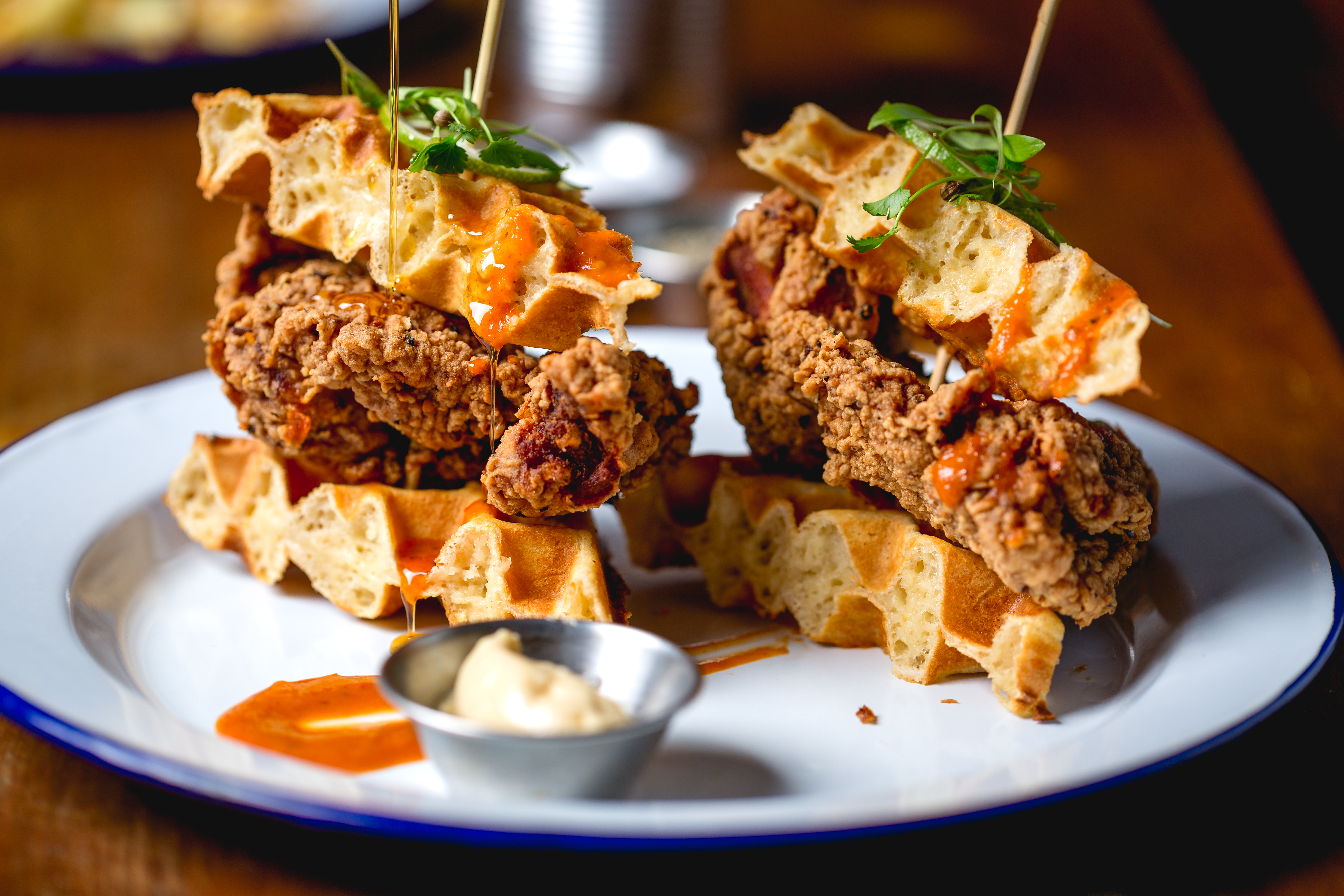 Crispy fried chicken and waffles dish for event catering at Prince Of Peckham.
