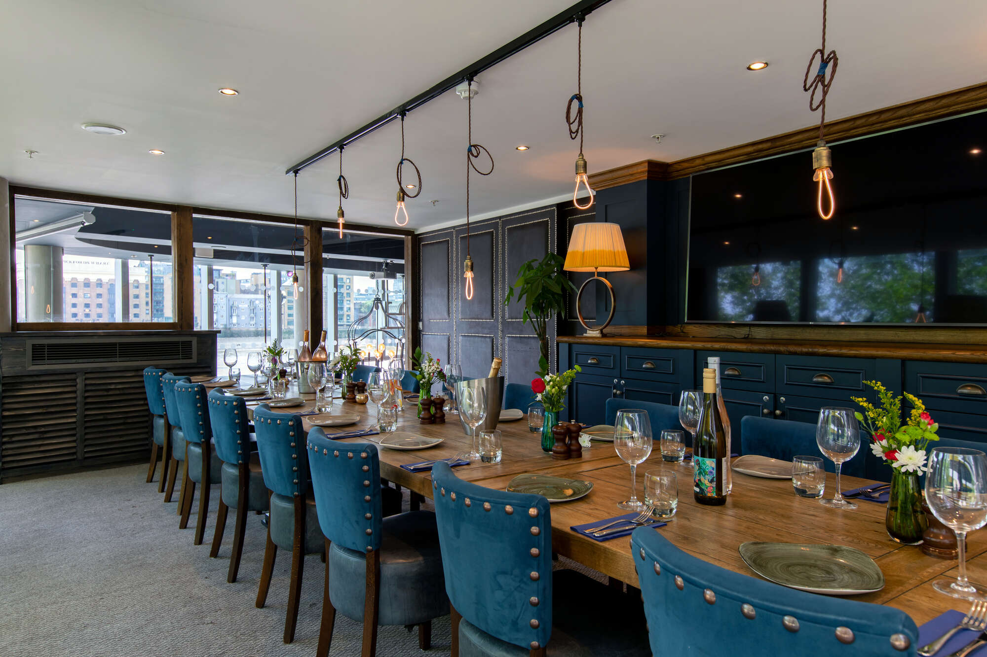 Elegant dining setup at The Captain's Table for corporate meetings and upscale events.