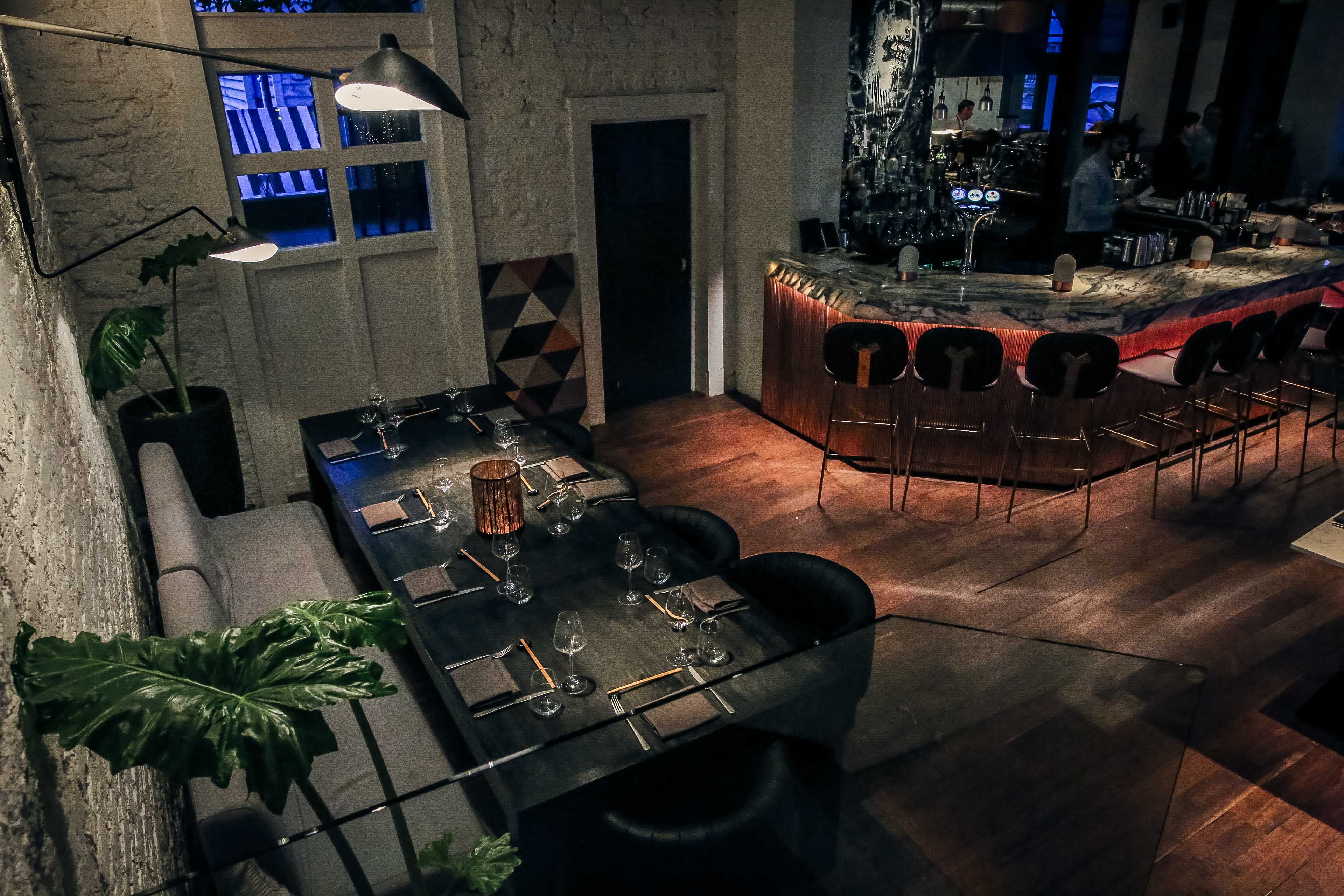 Robata Grill Restaurant: modern event space with ambient lighting for gatherings and meetings.