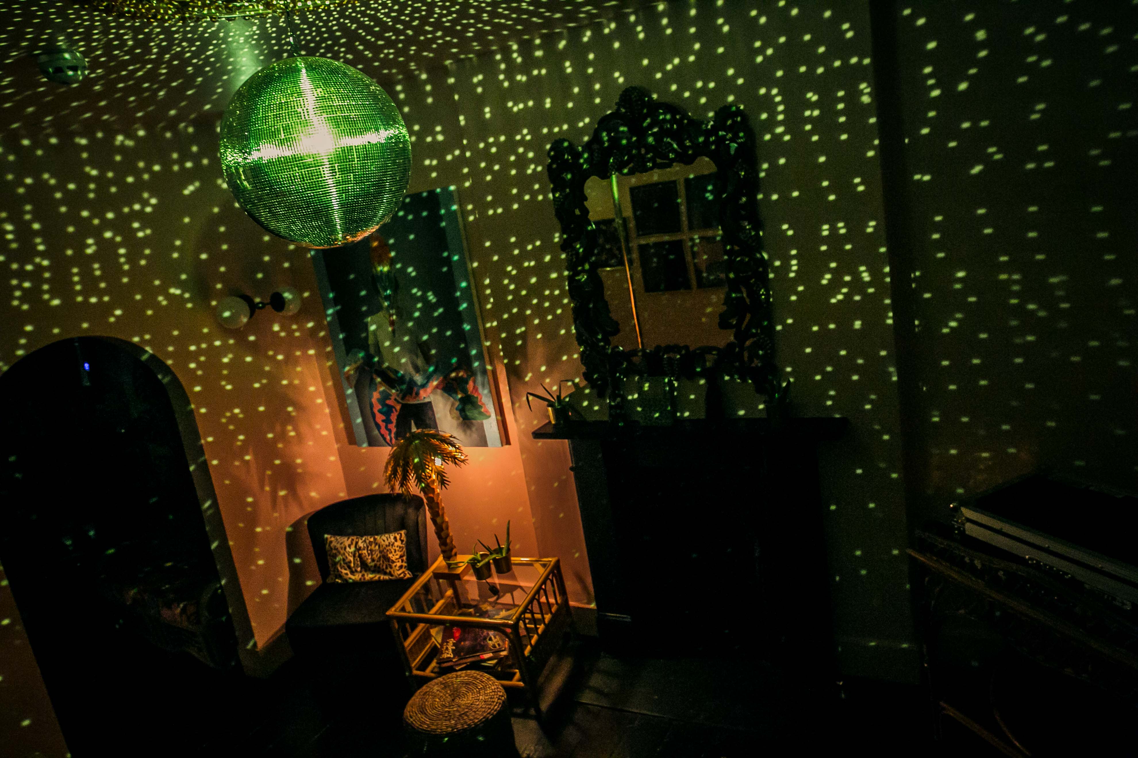 Tequila and Mezcal Parlour with disco ball, ideal for vibrant social events and celebrations.