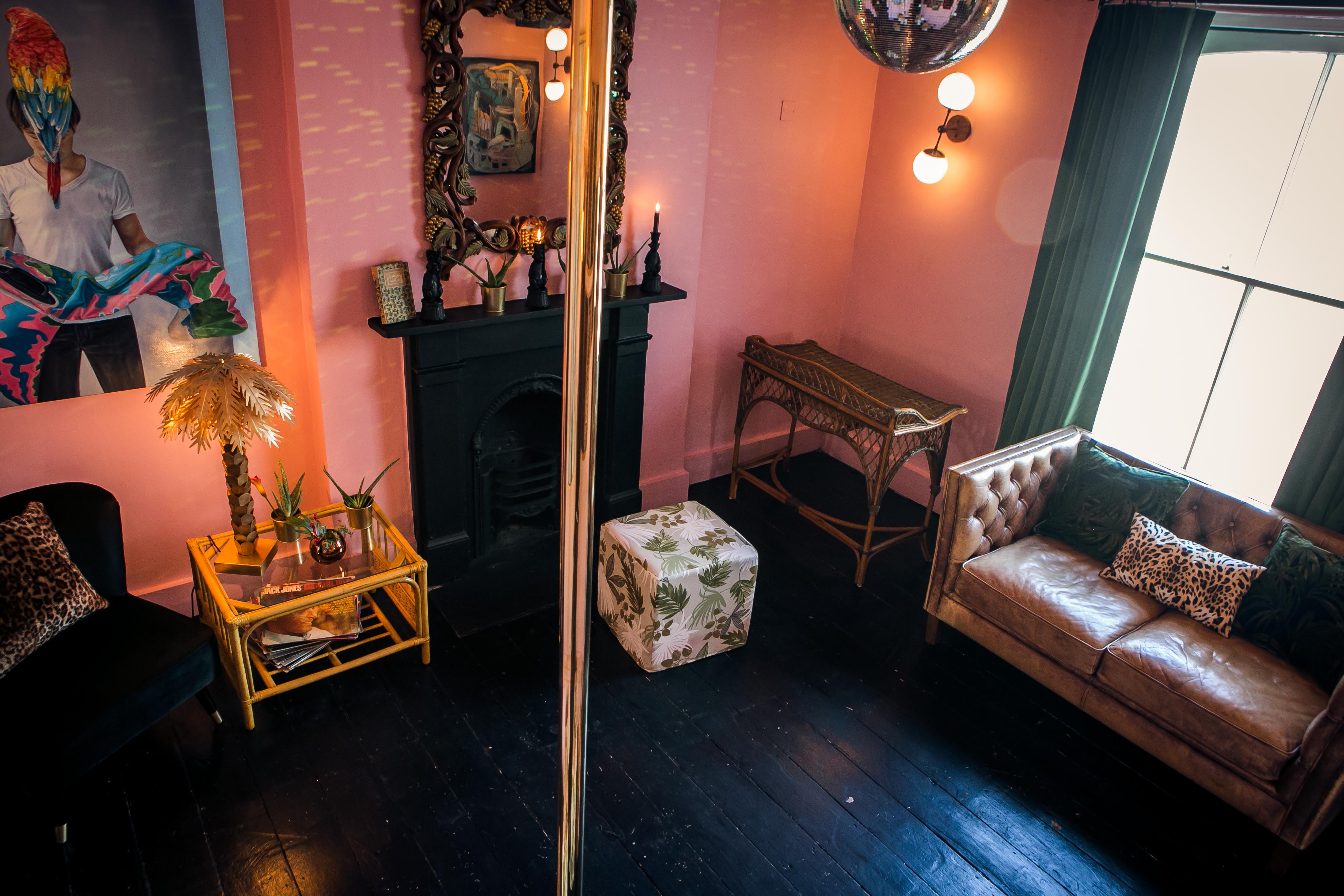 Tequila and Mezcal Parlour event space with pink walls, ideal for parties and gatherings.