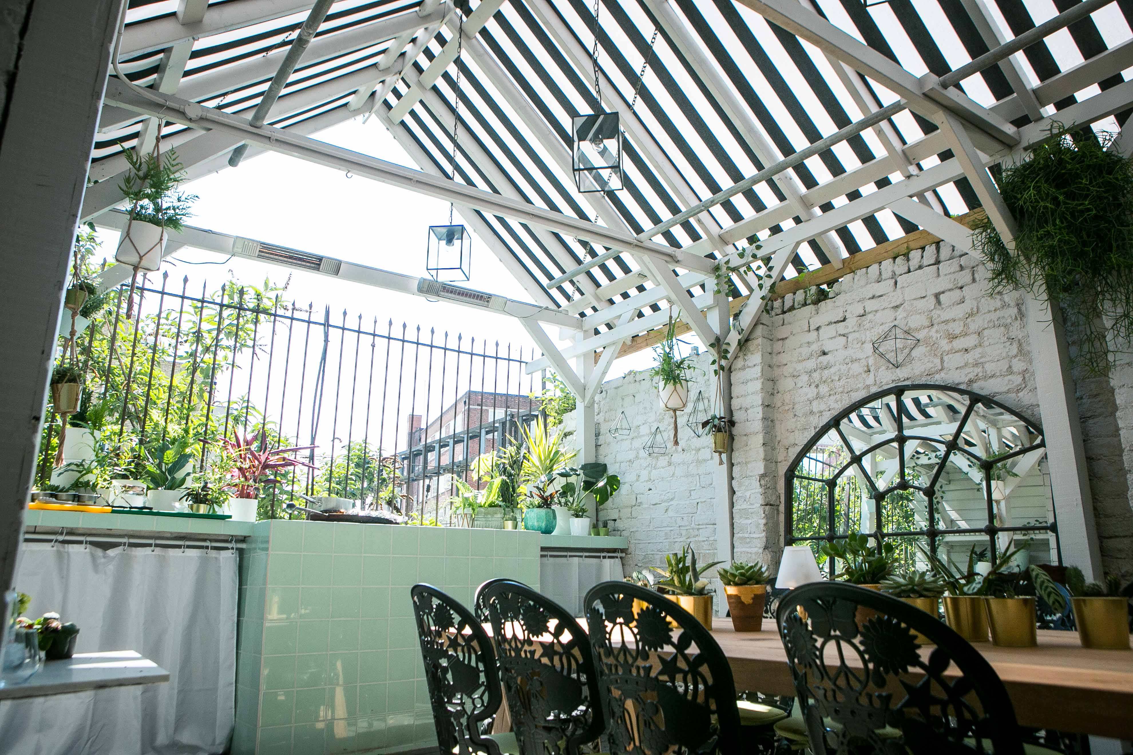 Al Fresco BBQ Garden with high ceiling, ideal for casual meetings and networking events.