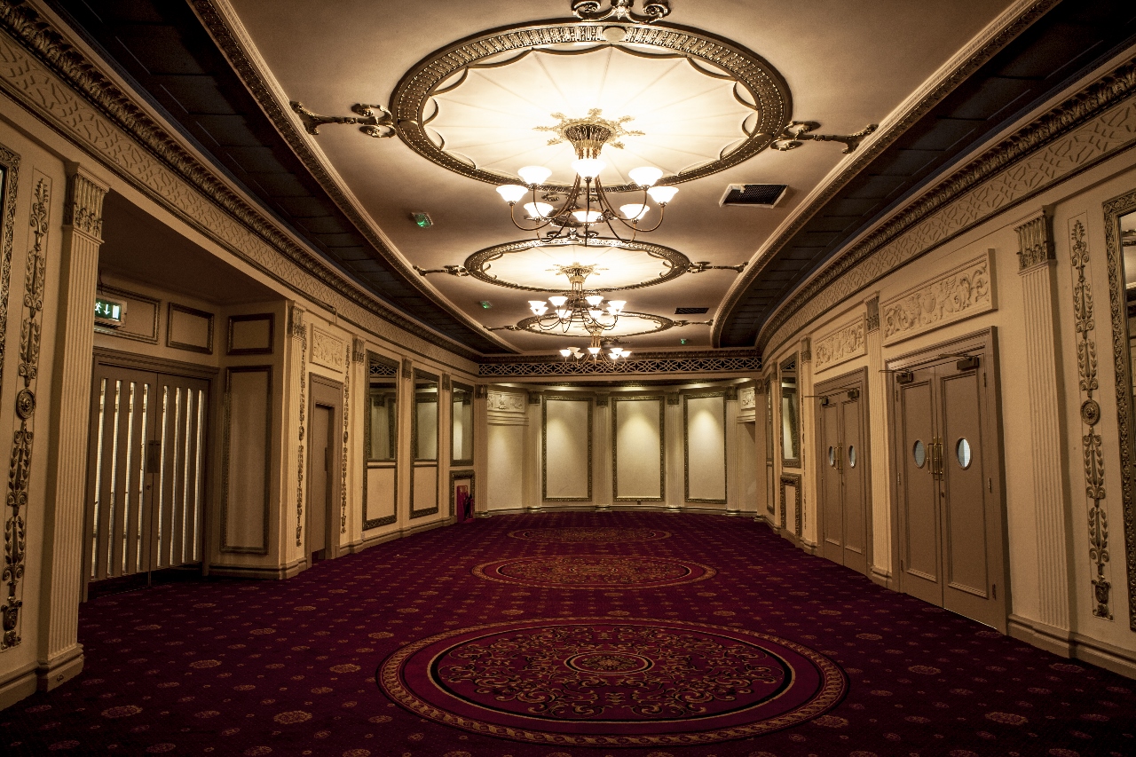 Elegant event space at GRACEPOINT with chandeliers, perfect for upscale gatherings.