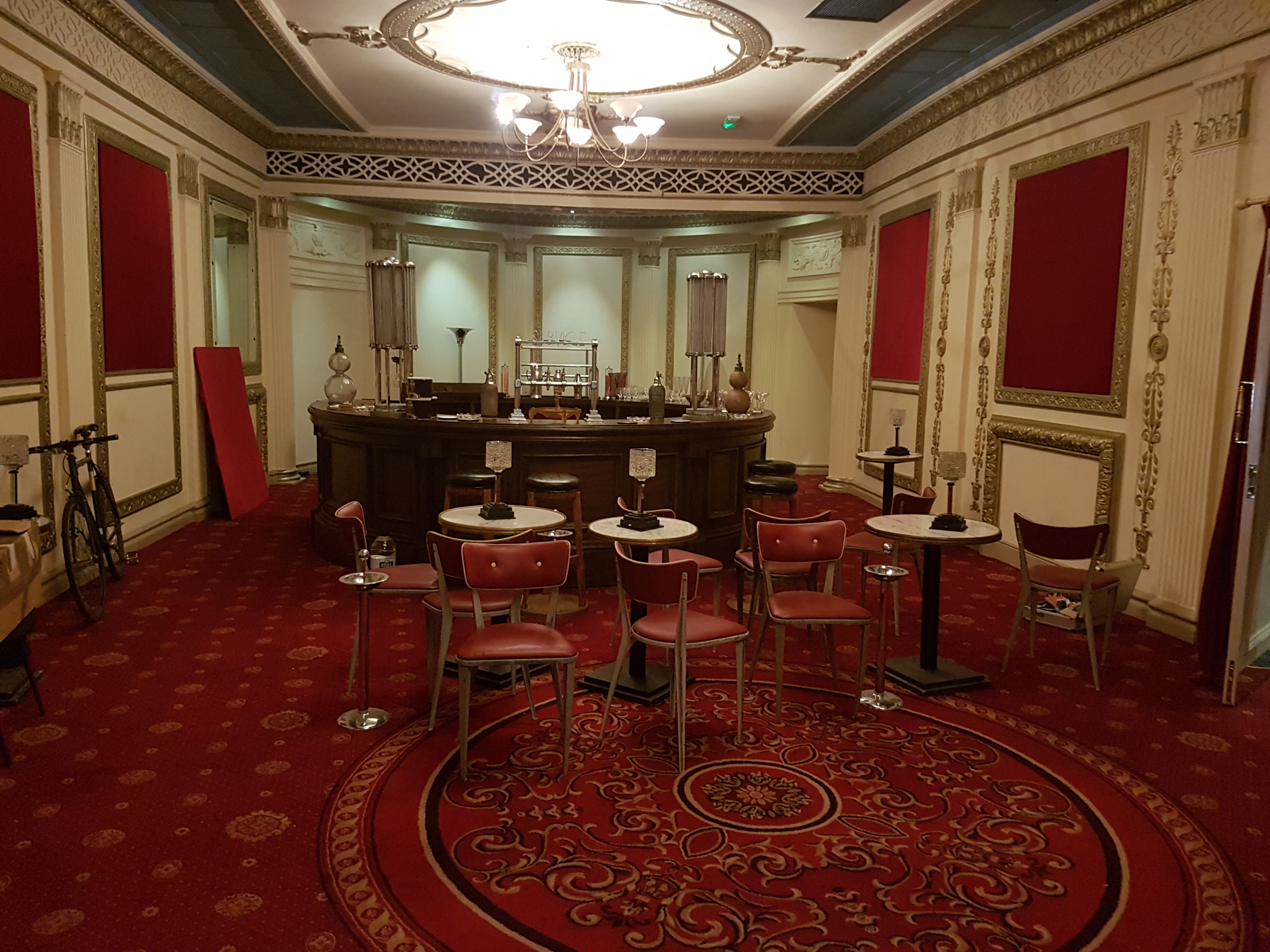 Elegant event space at GRACEPOINT with rich red decor for upscale gatherings.