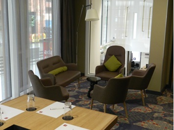 Cozy Hersum Meeting Room in Adagio Birmingham for brainstorming sessions and collaboration.