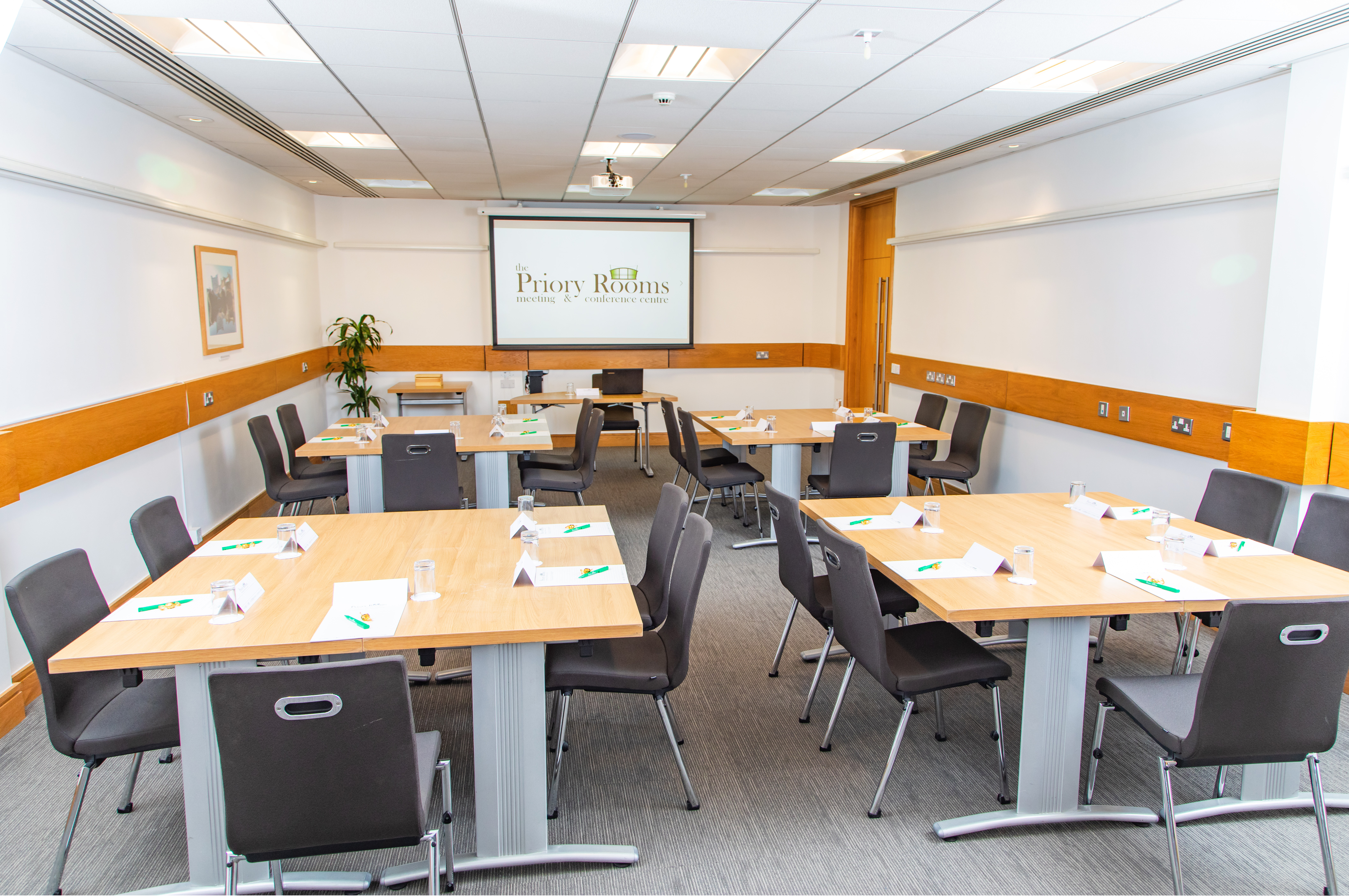 "Professional meeting room setup at The Priory Rooms for corporate events"