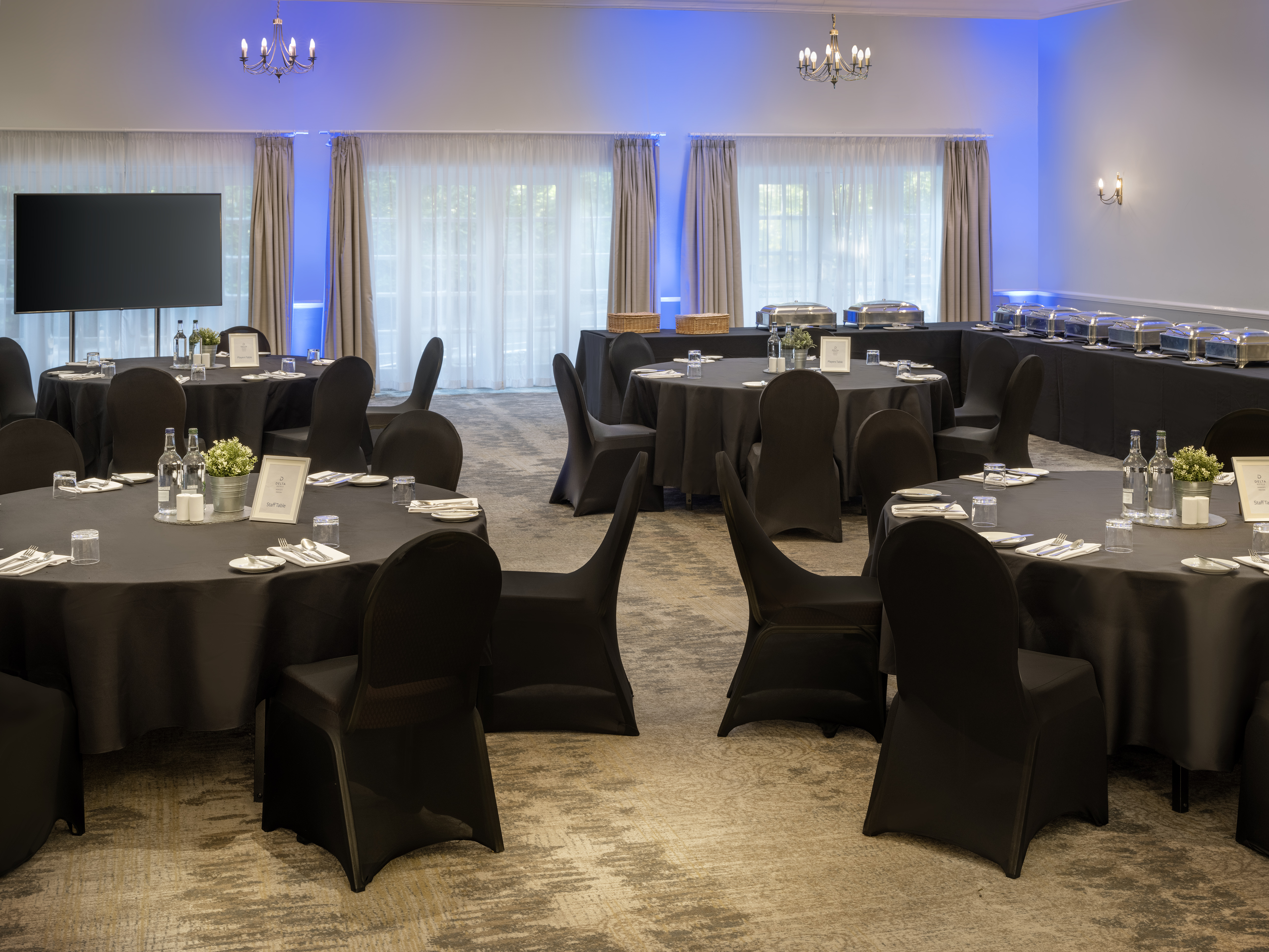 Broughton Suite at Delta Hotels: elegant event space with round tables for meetings and gatherings.