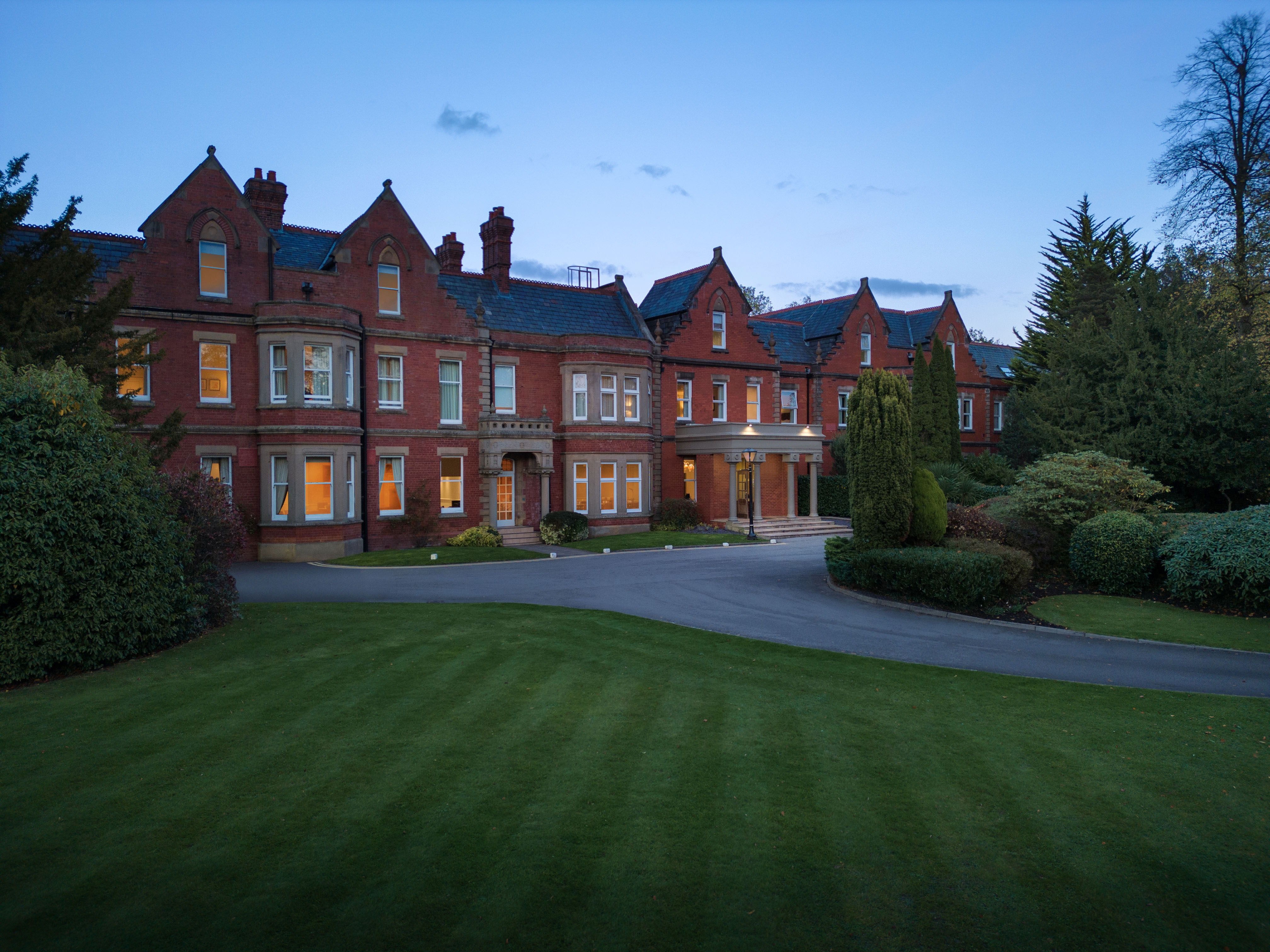Garden Room at Delta Hotels Preston, elegant venue for meetings and events, brick exterior.