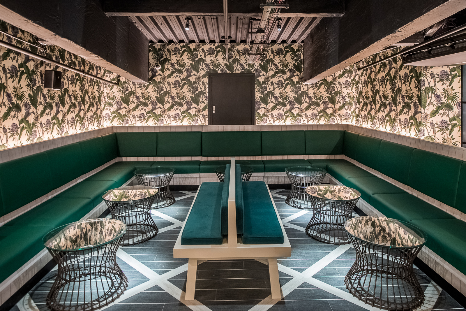 Stylish Palm Lounge at Swingers West End, perfect for intimate meetings and networking.