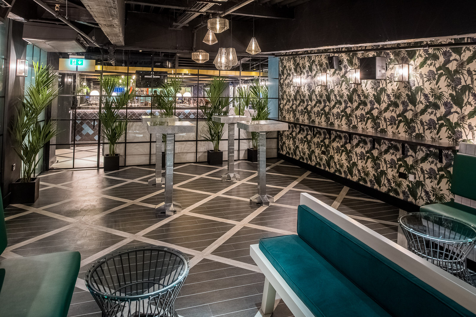 Stylish Palm Lounge at Swingers West End, perfect for networking and social events.