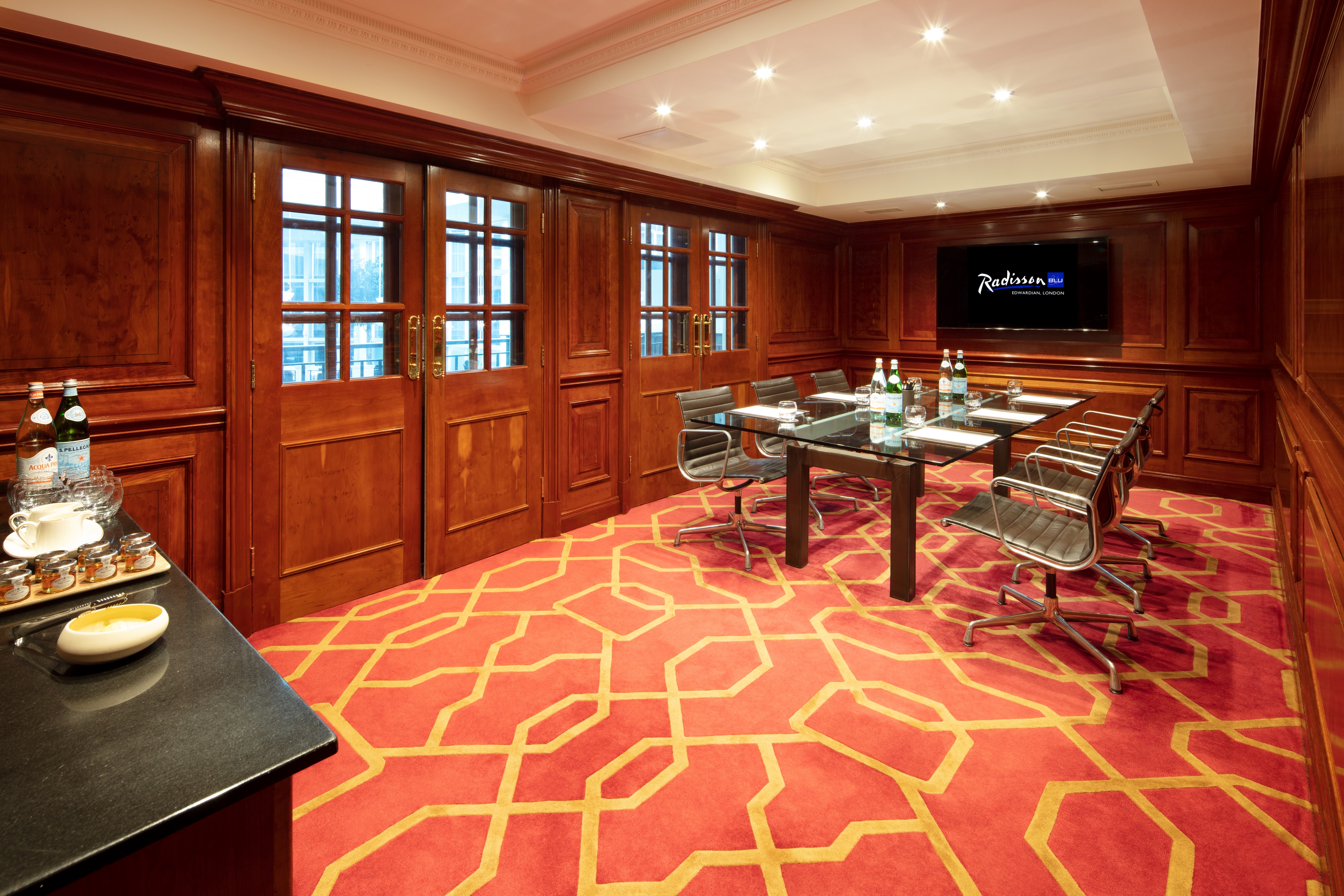Private Room 30 at Radisson Blu Heathrow, elegant meeting space with modern furnishings.