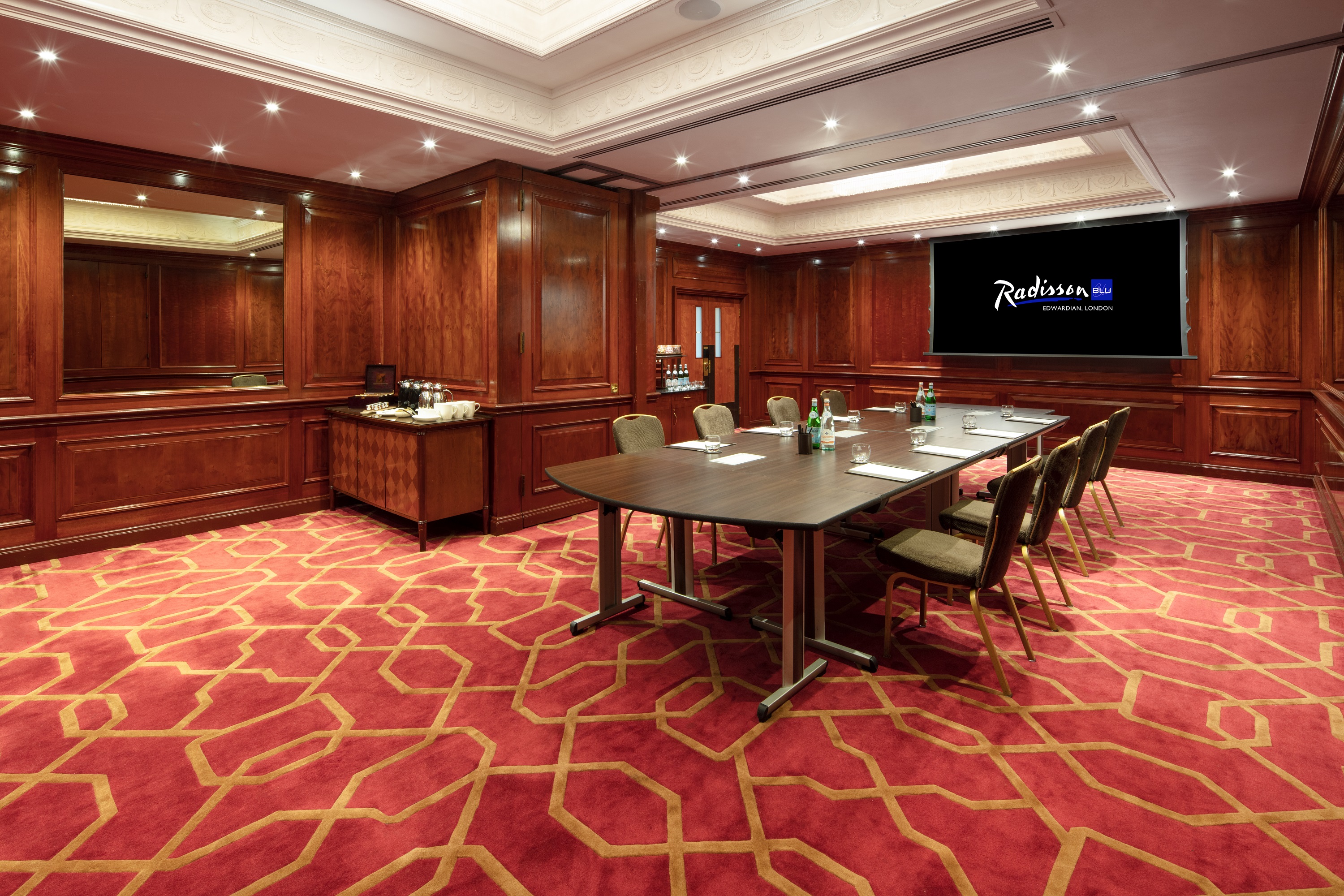 Private Room 33 at Radisson Blu Heathrow, featuring a large conference table for corporate events.