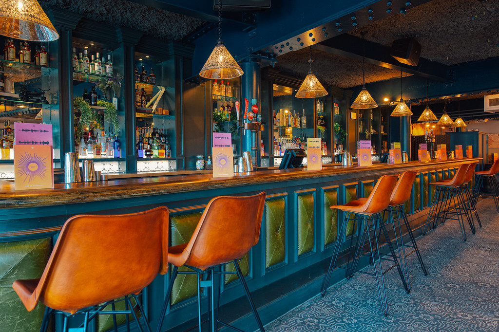 Stylish bar in Revolution York, perfect for networking events and cocktail receptions.