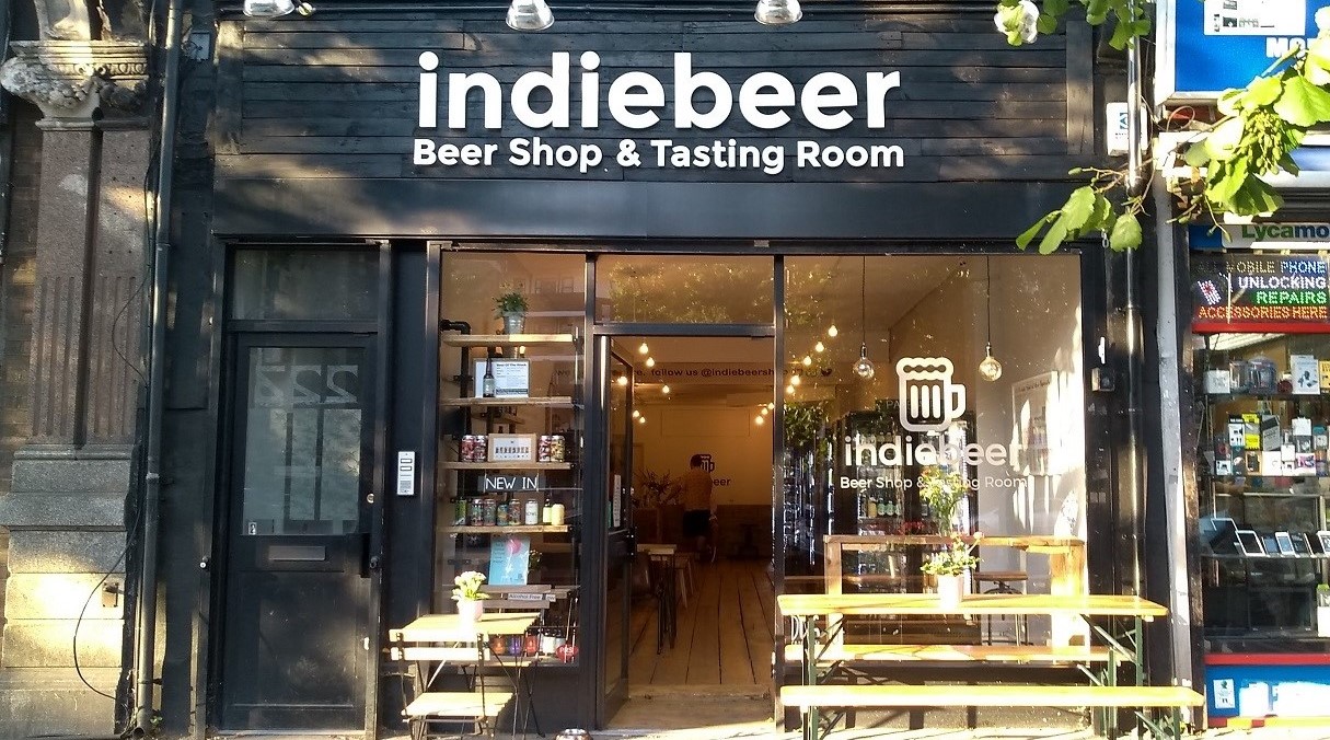 Cozy beer shop venue with outdoor seating for intimate gatherings and tastings.