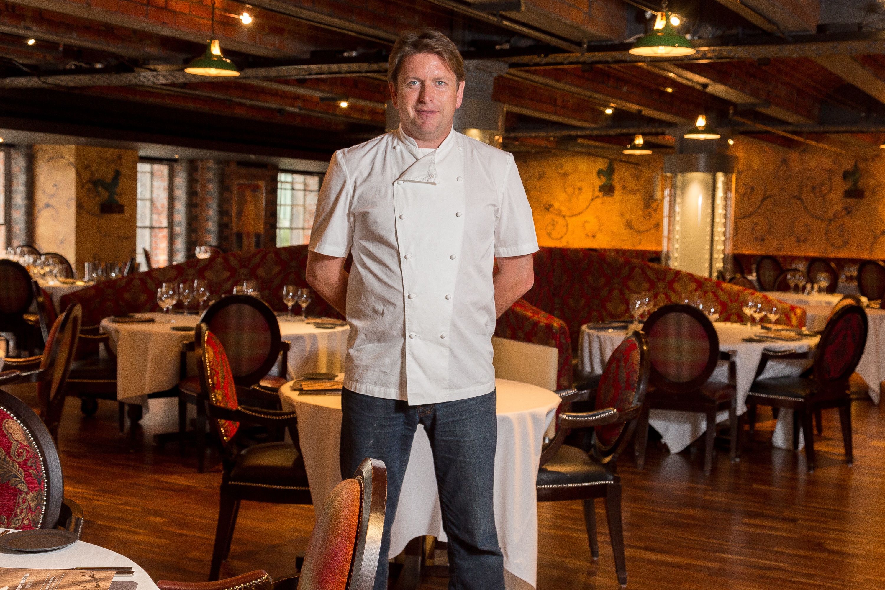 Professional chef at James Martin restaurant, Manchester - ideal for upscale events and dining.