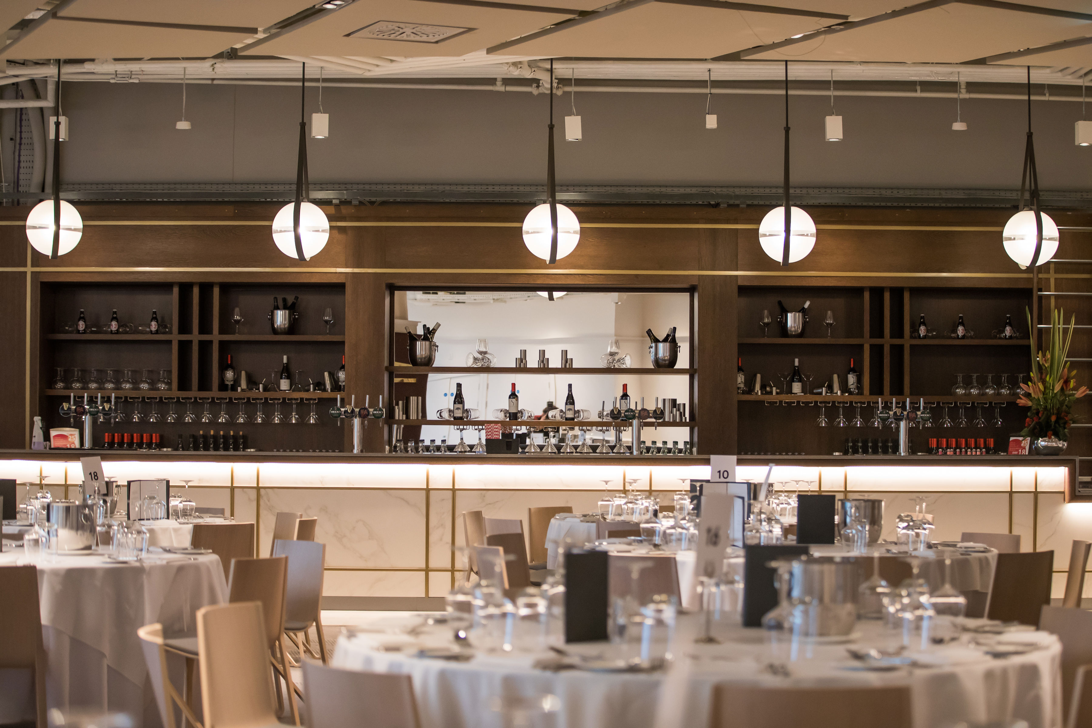 Lock No. 4 at Allianz Stadium, Twickenham: Elegant event venue with modern dining setup.