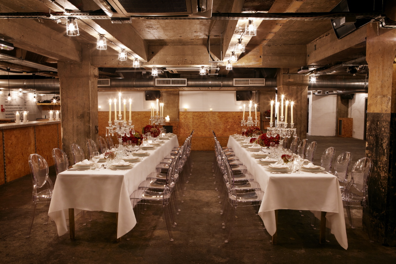 Sophisticated event space with elegant tables, ideal for formal dinners and corporate gatherings.