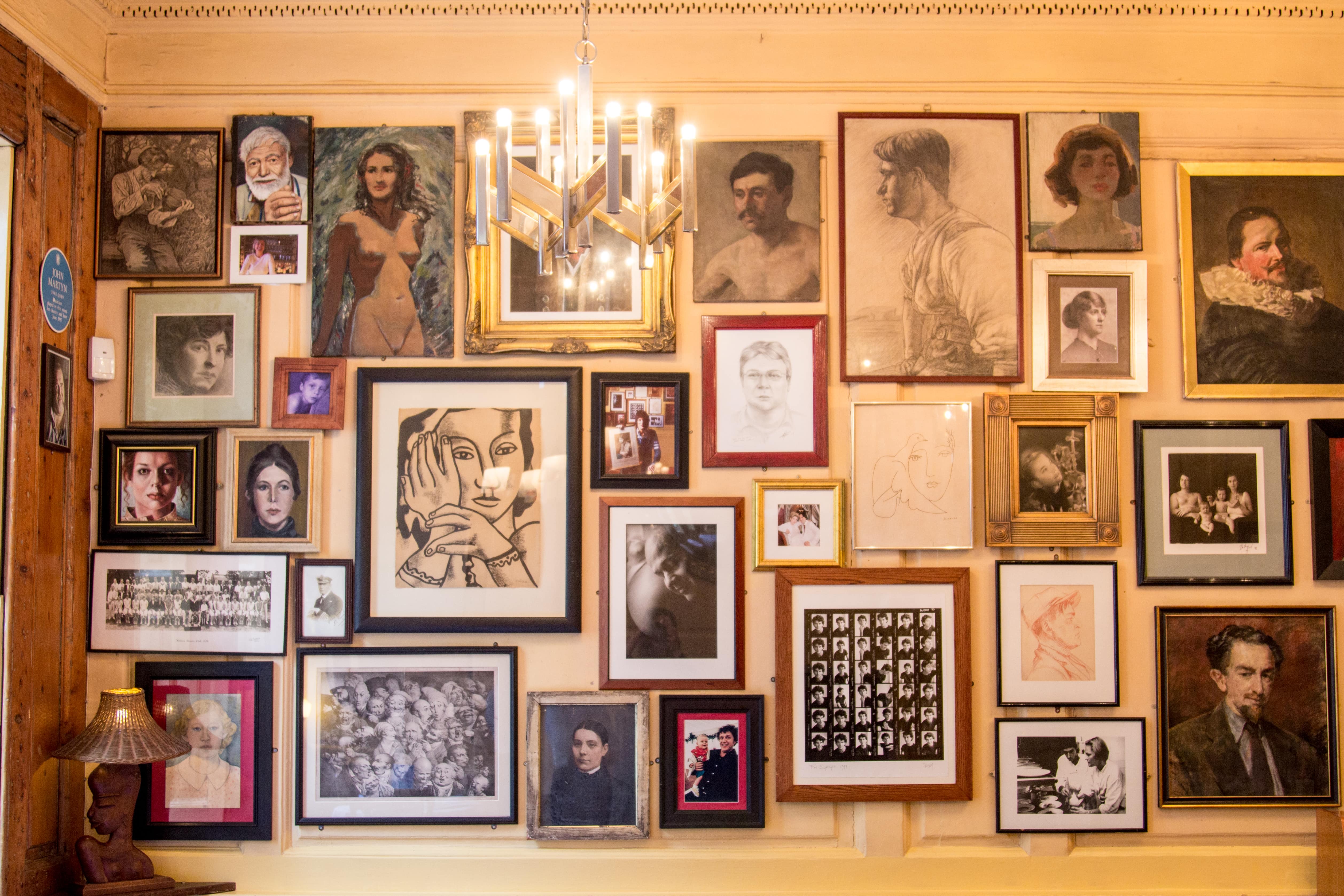 Dining Room at The Union Club with vibrant gallery wall, perfect for events and gatherings.