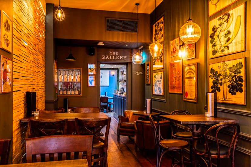 Cozy venue in The Vestry with warm lighting for intimate meetings and small events.