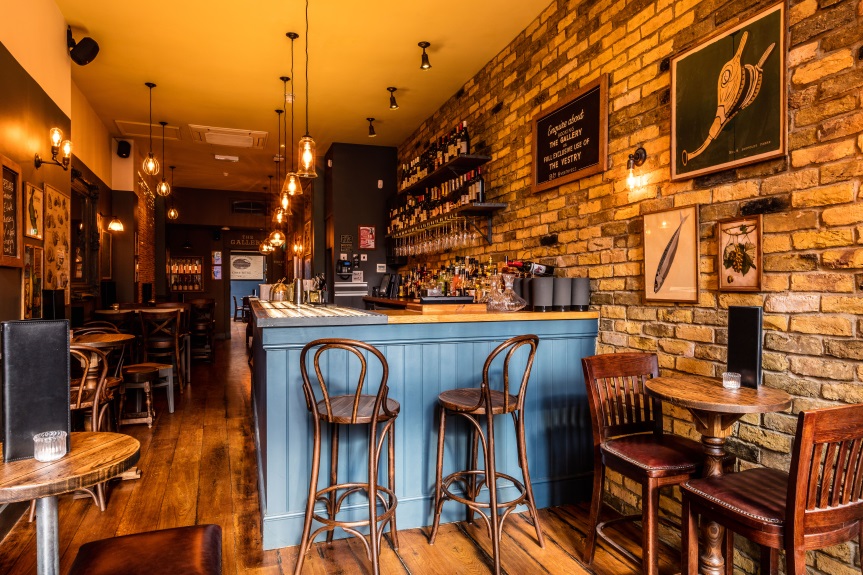 Cozy venue in The Vestry with warm lighting for intimate gatherings and networking events.