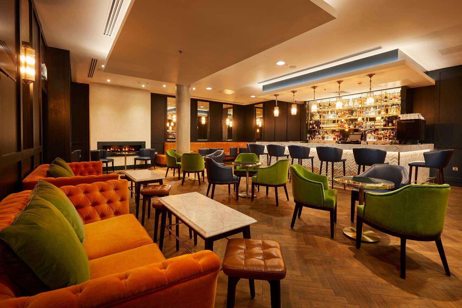 Modern lounge at Marlin Waterloo, vibrant decor ideal for networking events and gatherings.