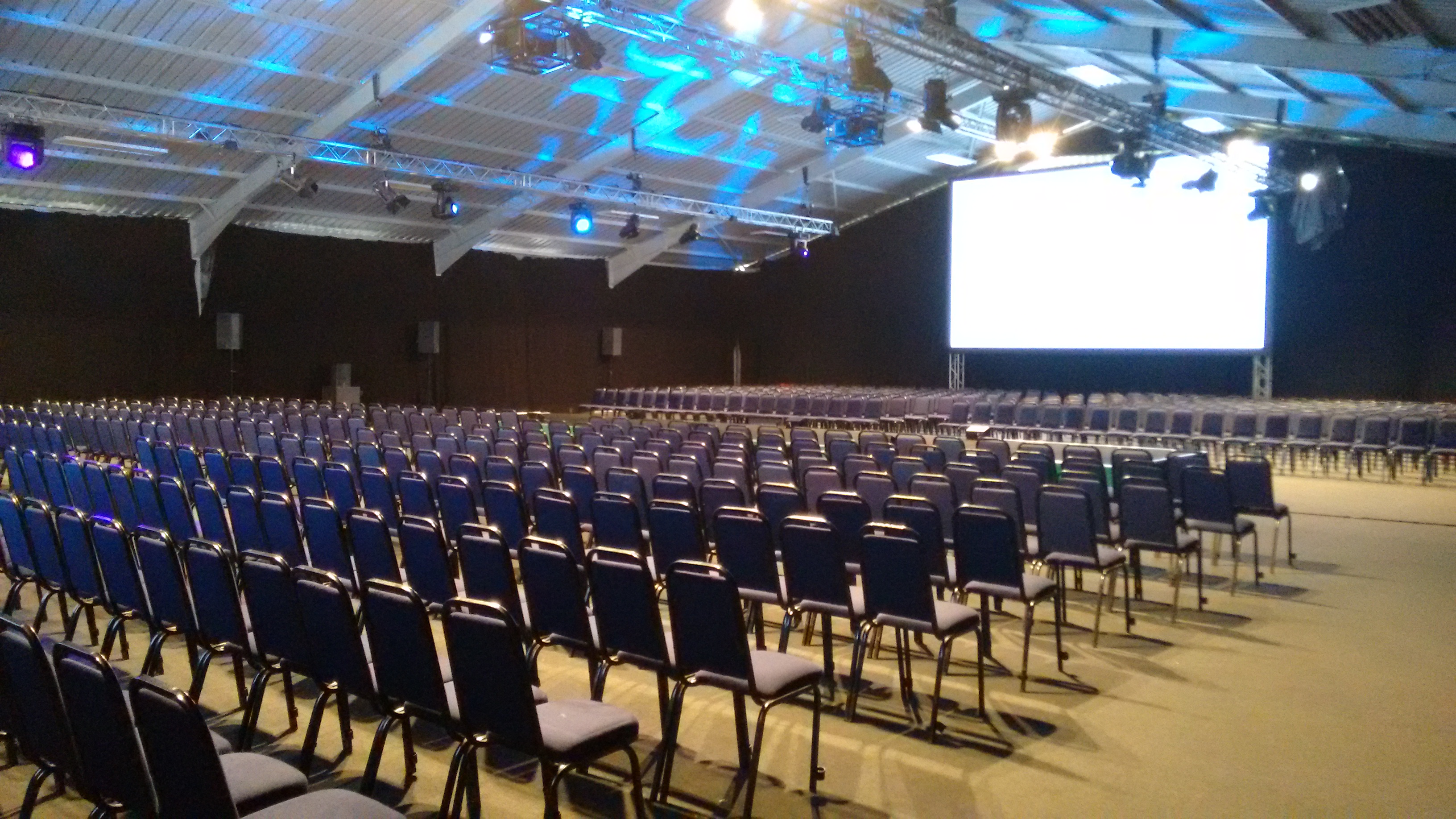 Spacious NAEC Stoneleigh Hall 3 set for a large conference with arranged chairs.