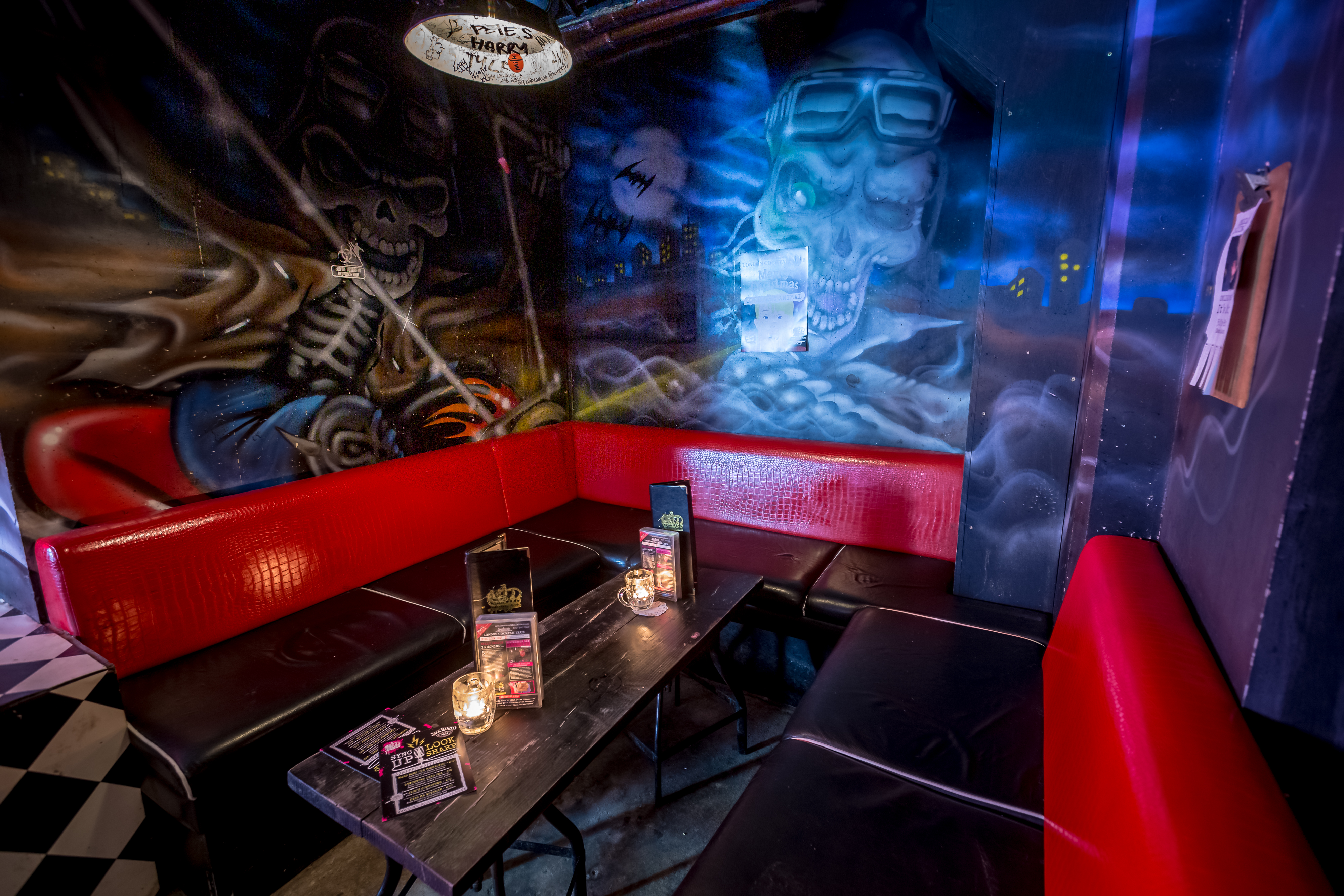 Vibrant lounge with graffiti art, ideal for social events and networking in Shoreditch.