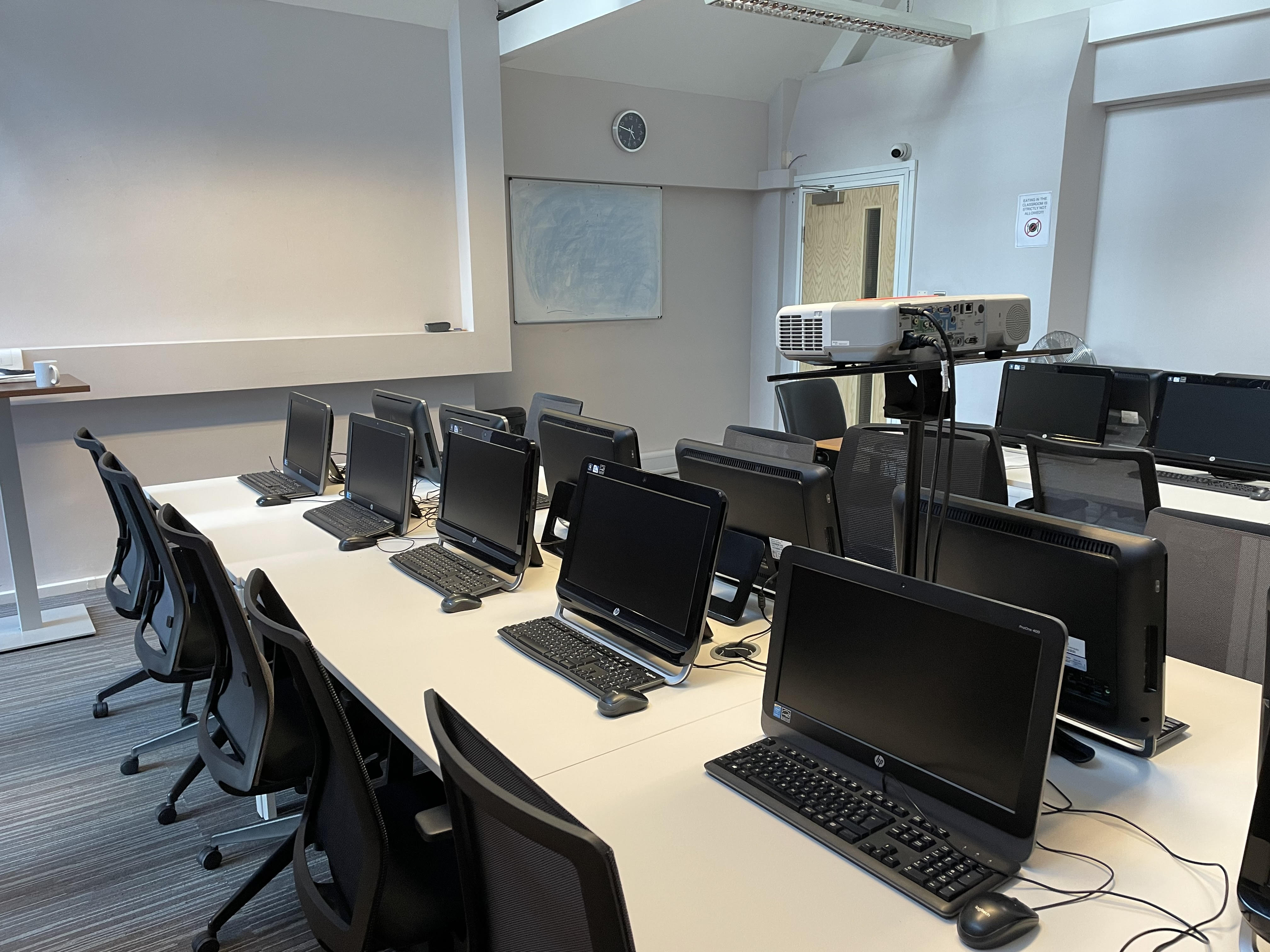 "Suite Thames meeting room with computer stations for training and workshops"