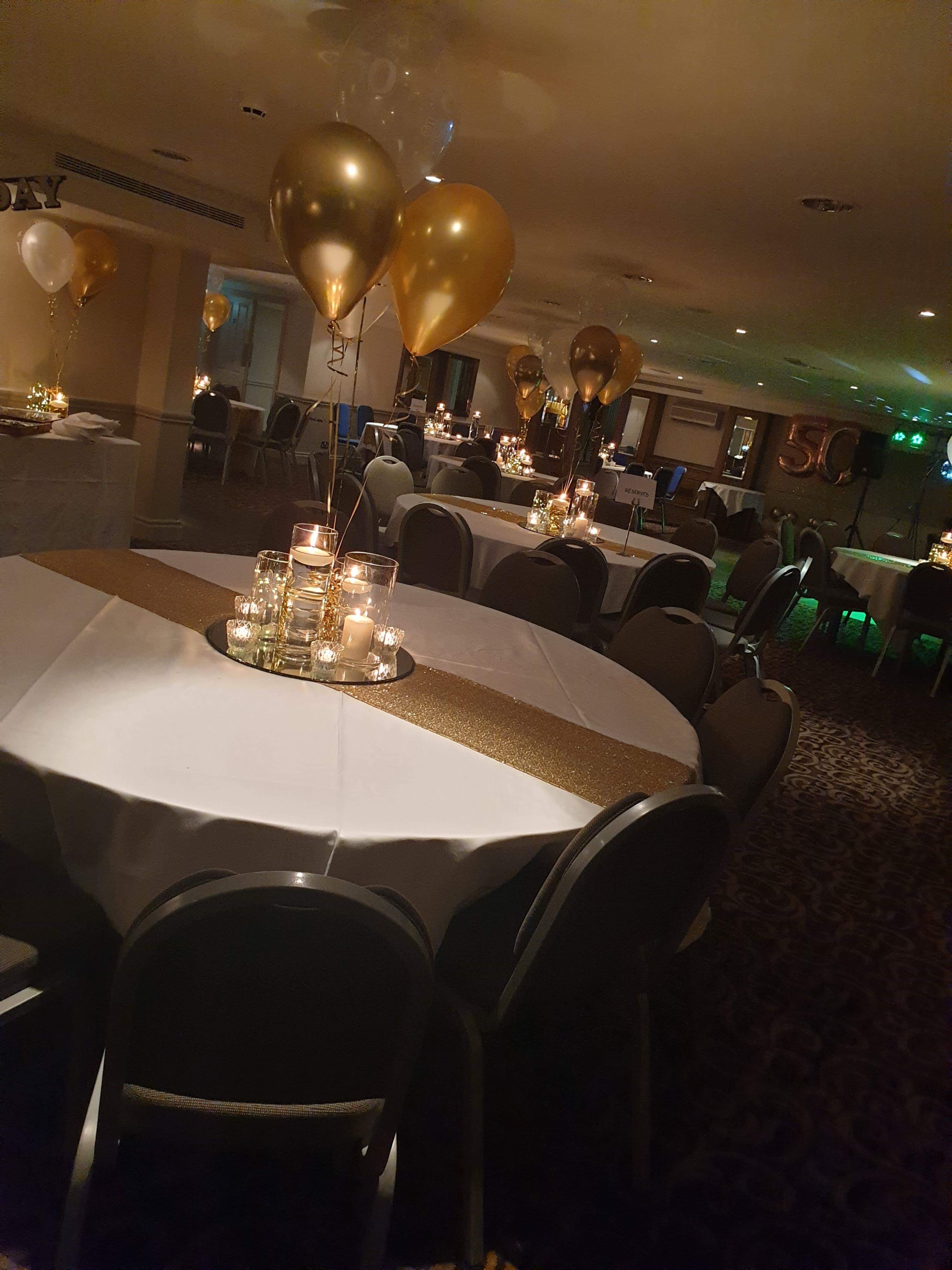 Elegant Tatton Suite event space with gold accents, perfect for celebrations and gatherings.