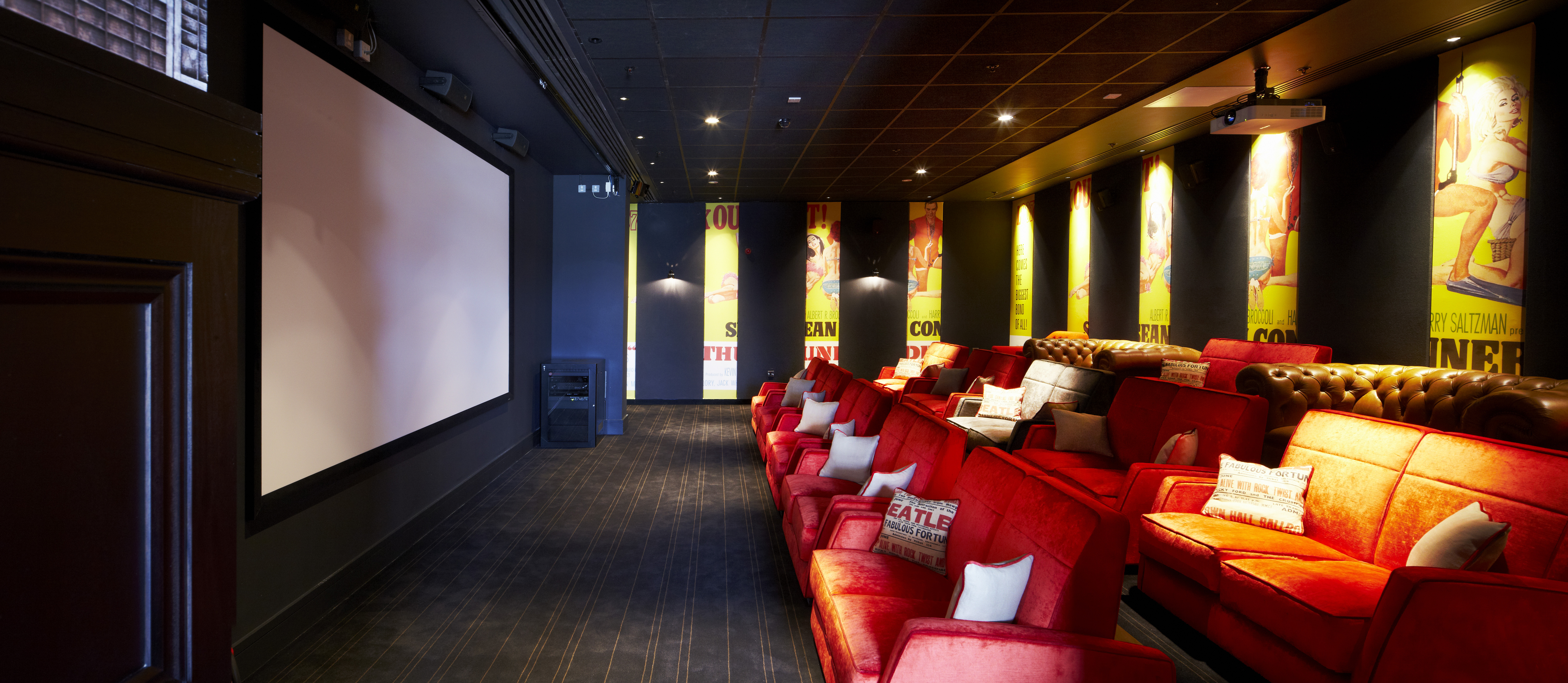 Cozy private screening room in Everyman Leeds with plush red seating for intimate events.
