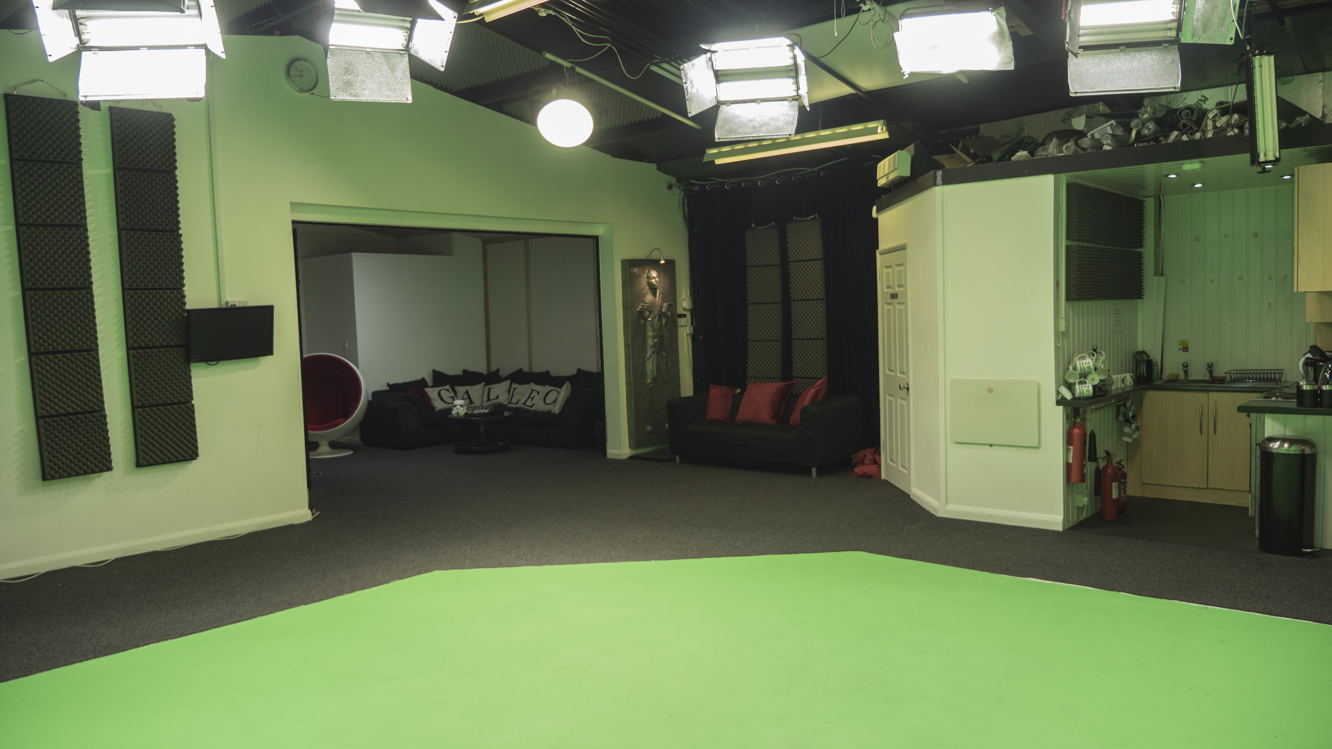 Infinity Cove event space with green screen, perfect for virtual meetings and workshops.