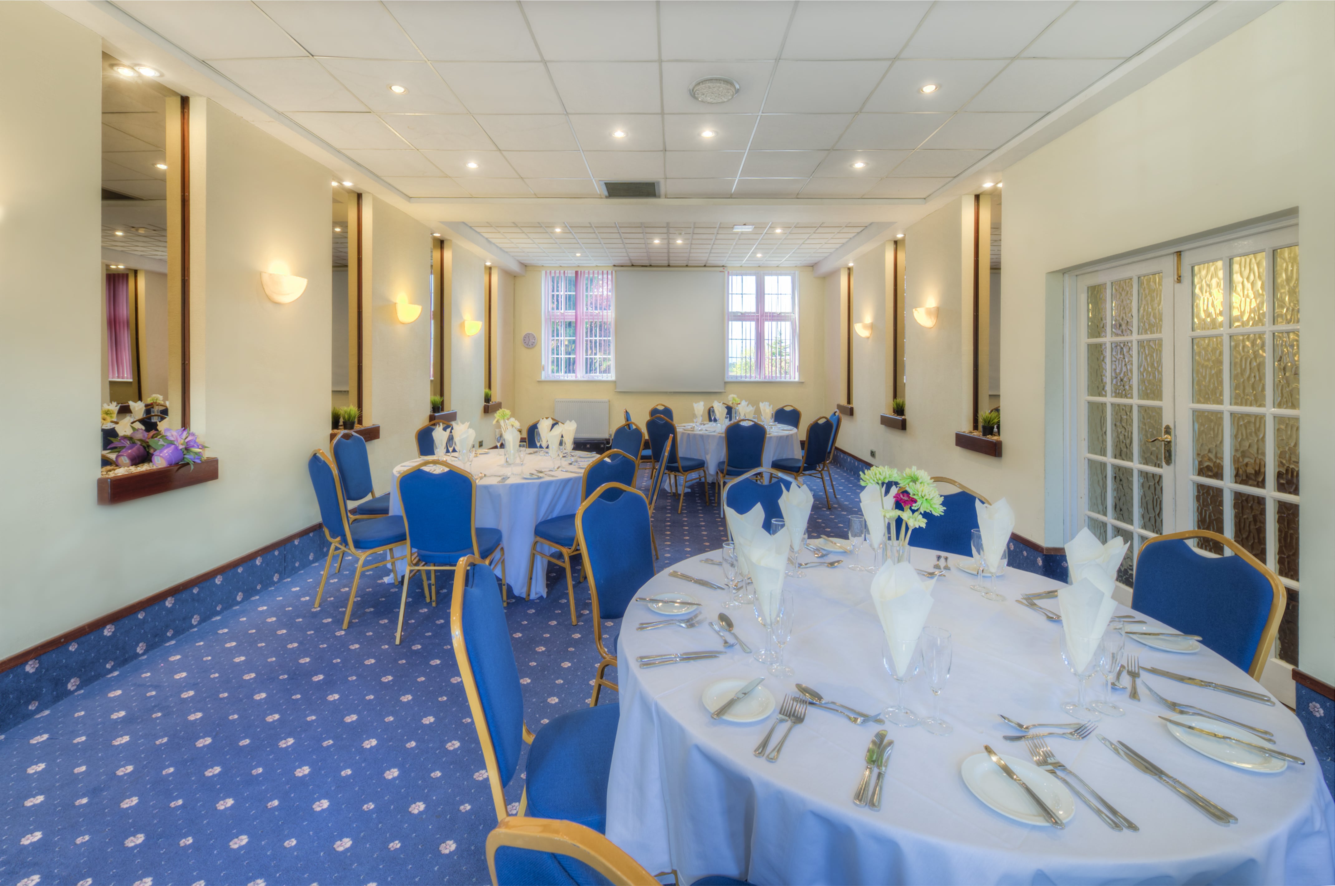 Meriden Suite at Quality Hotel Coventry, elegant dining setup for corporate events.