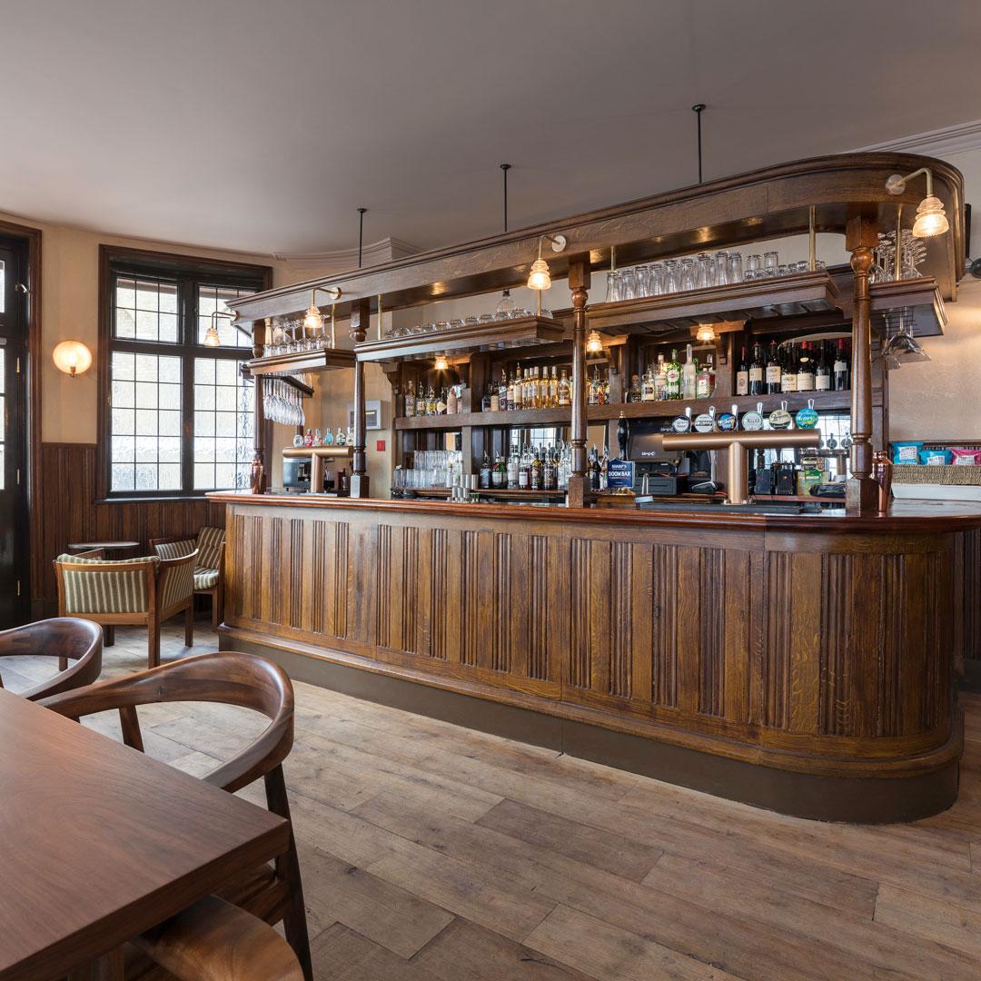 The Ballroom at The Sekforde: elegant bar, warm ambiance for networking events.