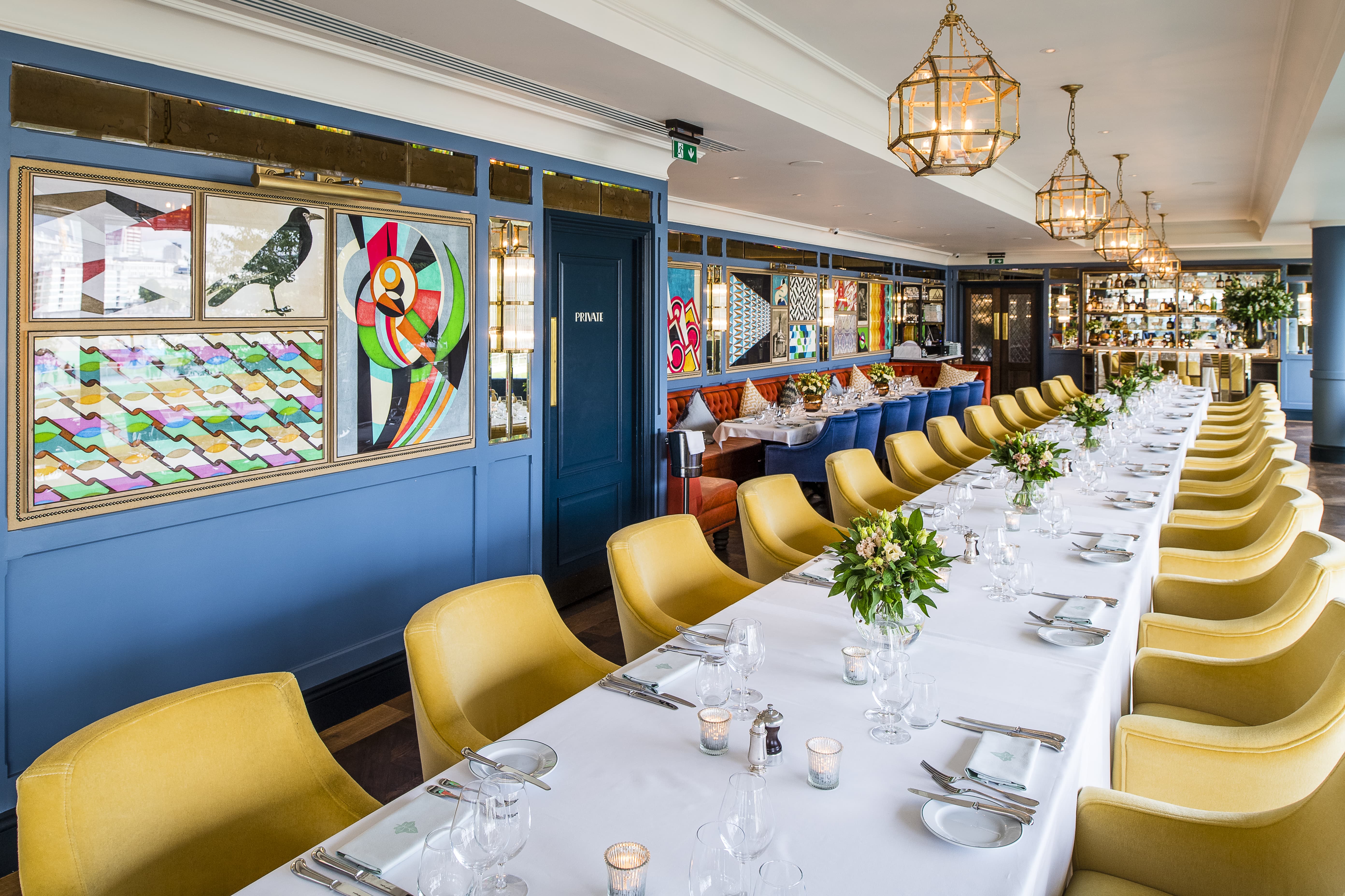 Elegant dining room with yellow chairs for upscale events at The Ivy Tower Bridge.