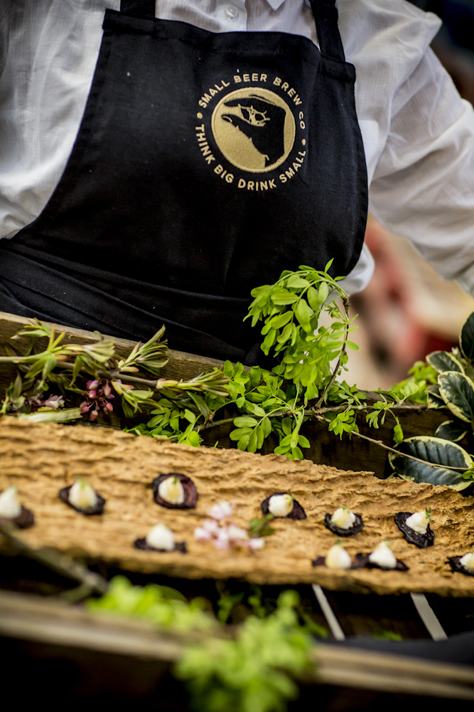 Main Brew Room at Small Beer Brewery with vibrant greenery for eco-themed events.