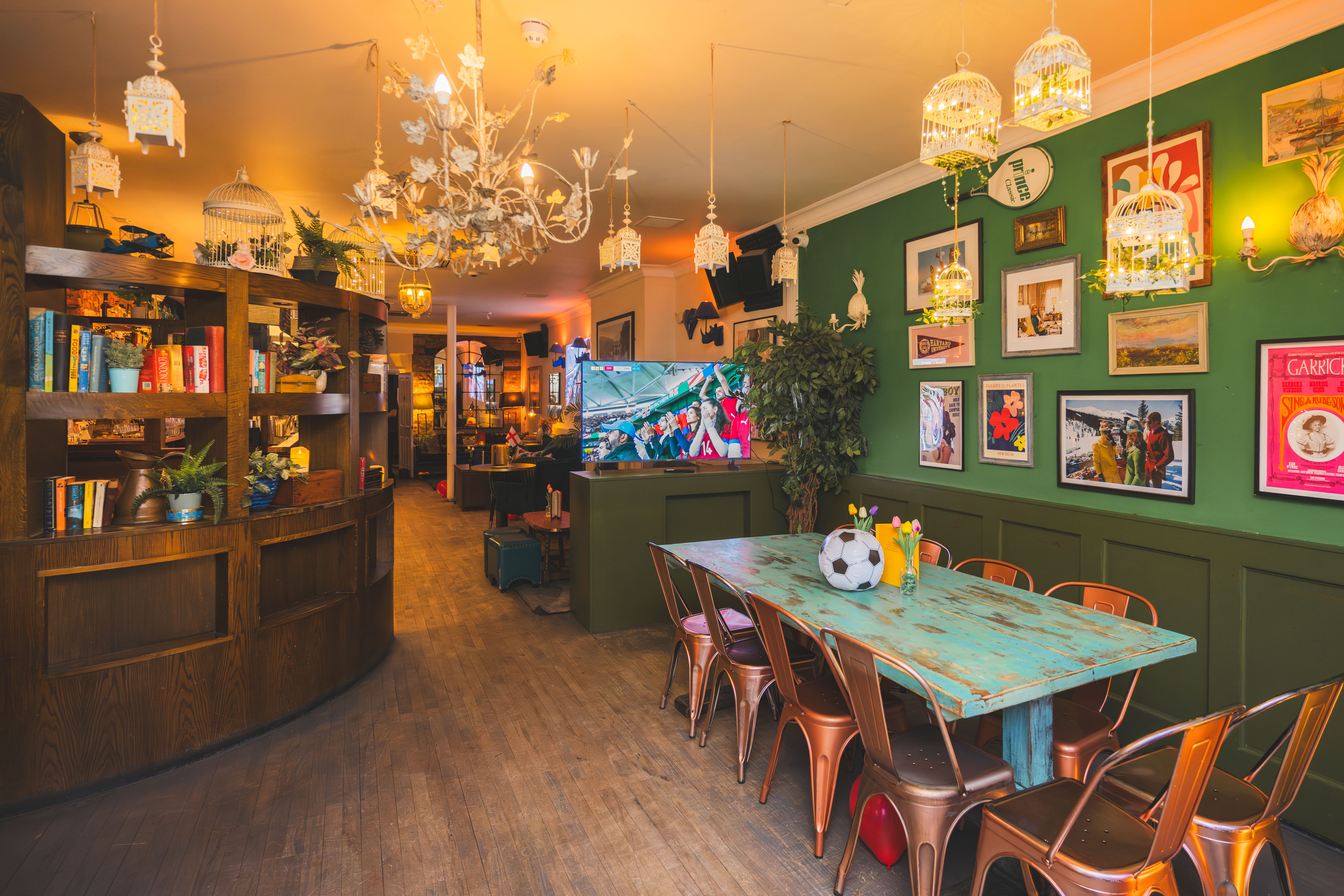 Cozy event space with vibrant decor, perfect for meetings and social gatherings.