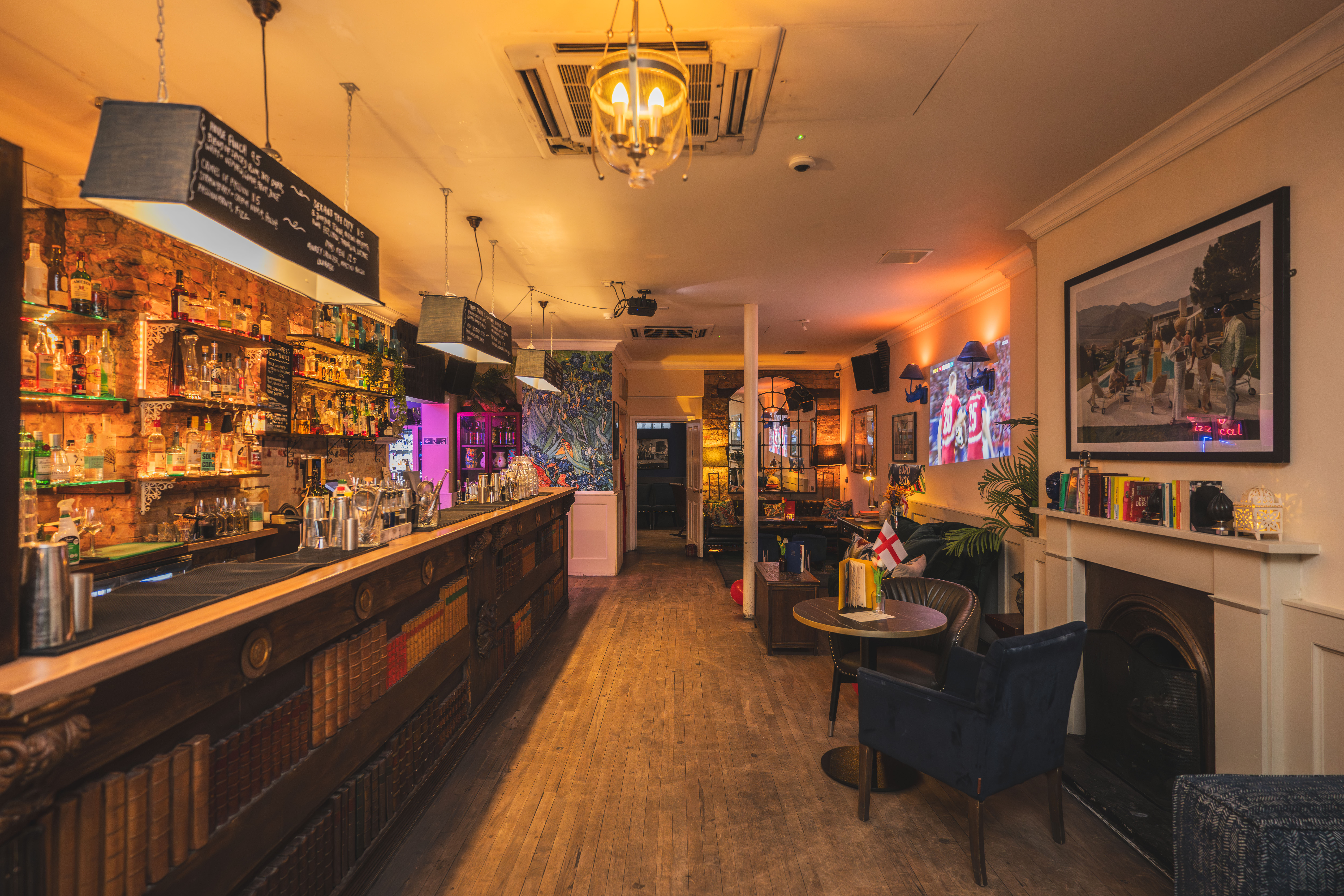 Stylish bar at The Little Blue Door, perfect for intimate gatherings and networking events.