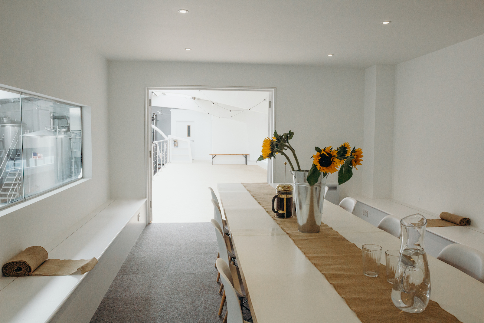 Bright boardroom at Small Beer Brewery, perfect for meetings and workshops with natural light.