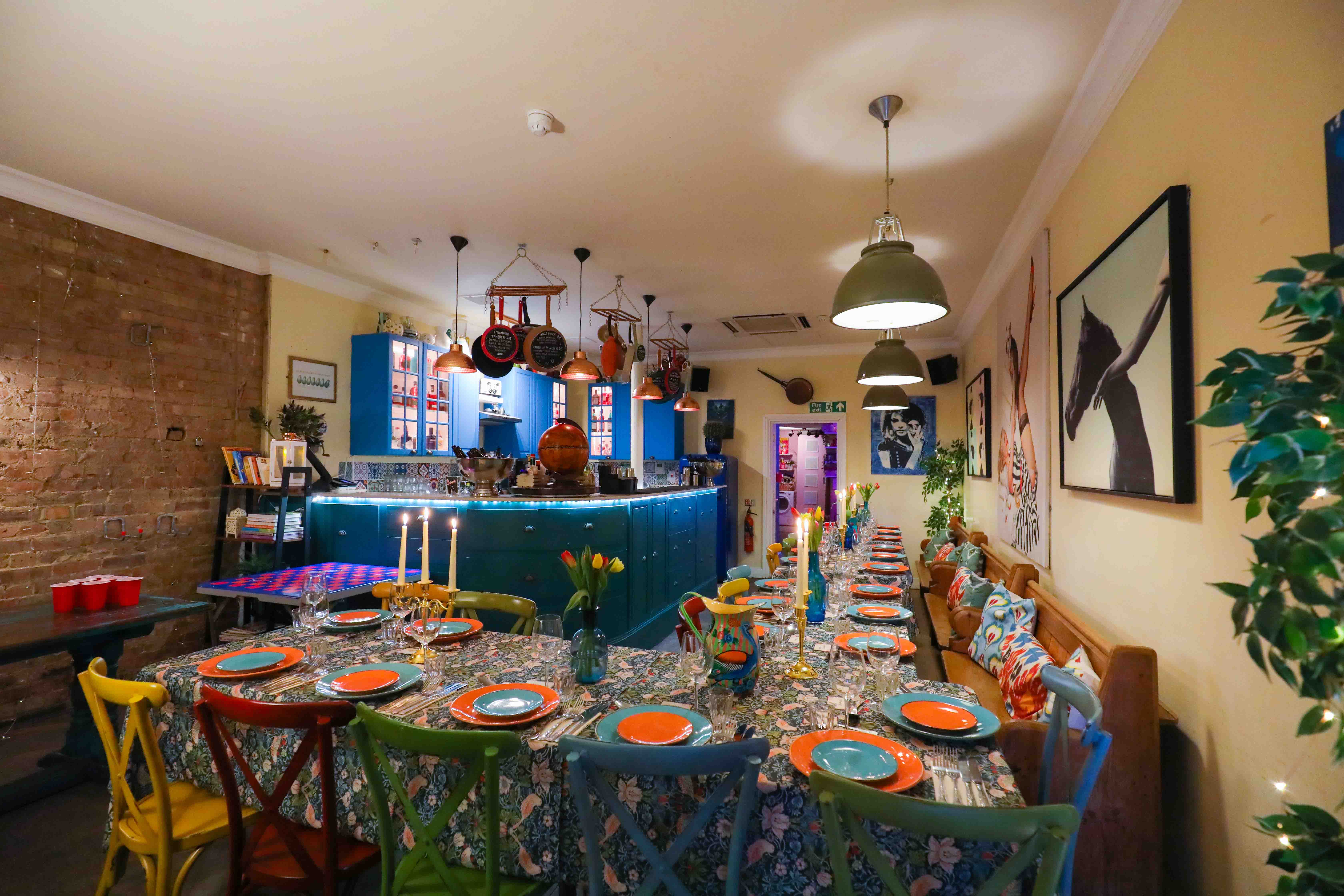 Vibrant event space at The Little Blue Door, perfect for intimate gatherings and themed dinners.